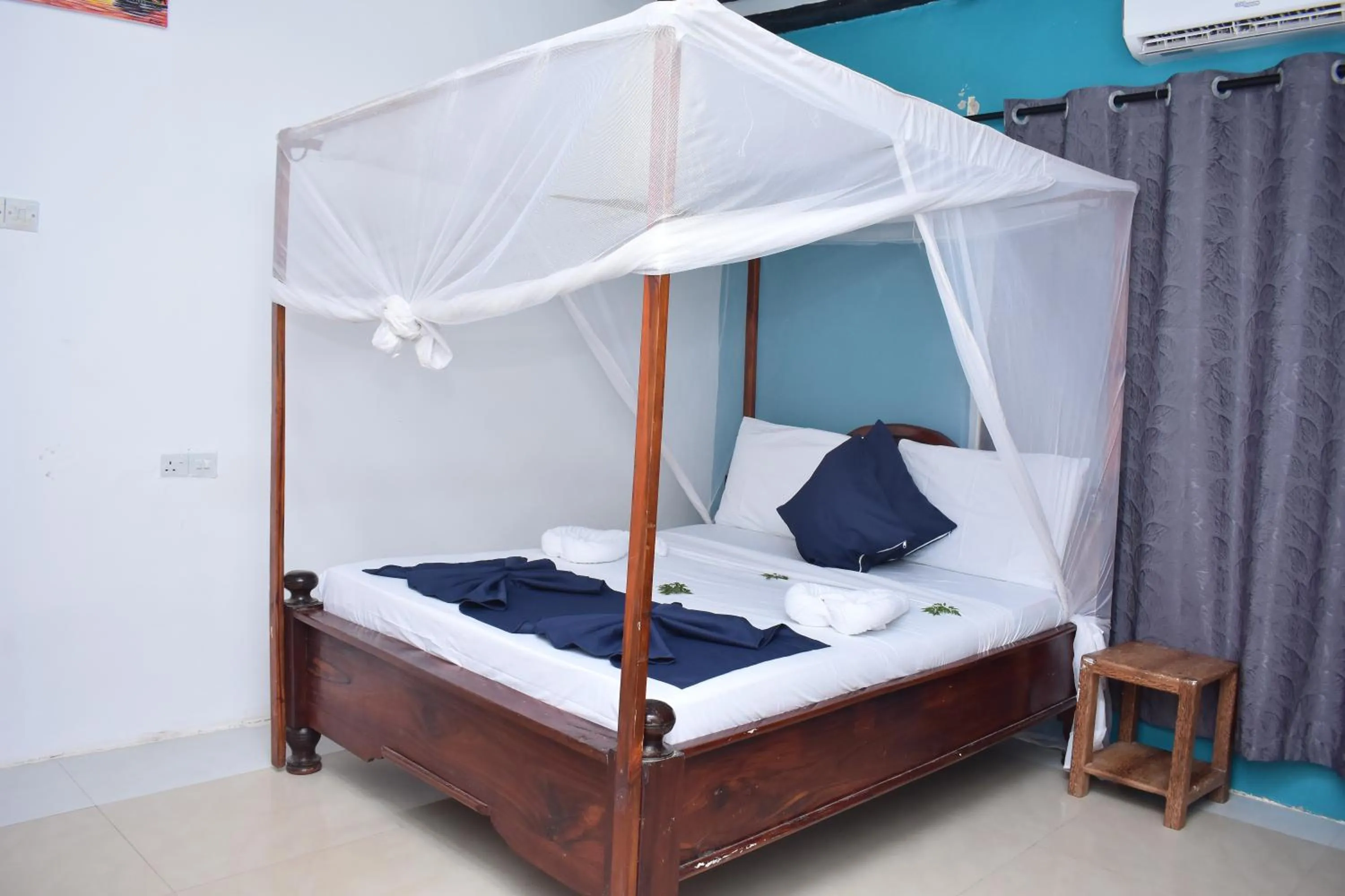 Bed in La Neisha Hotel Nungwi