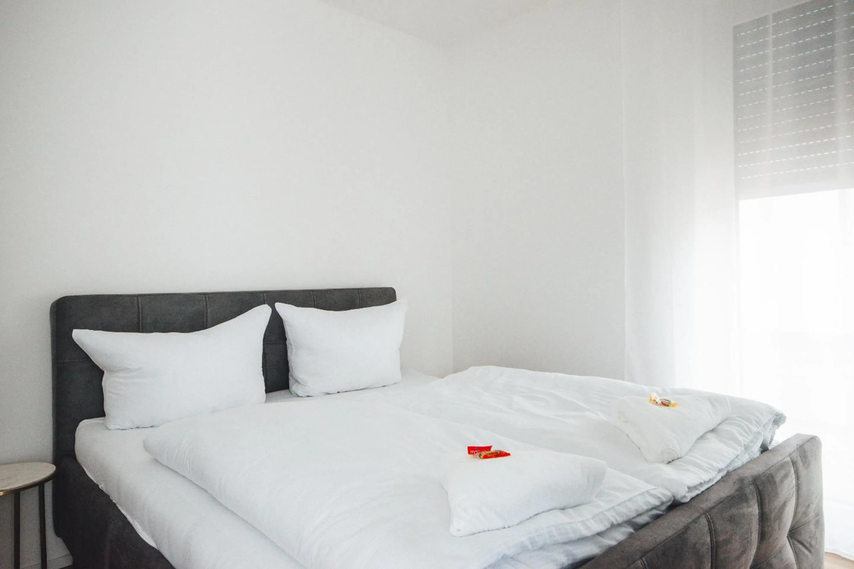 Bedroom, Bed in THE WOS Apartments