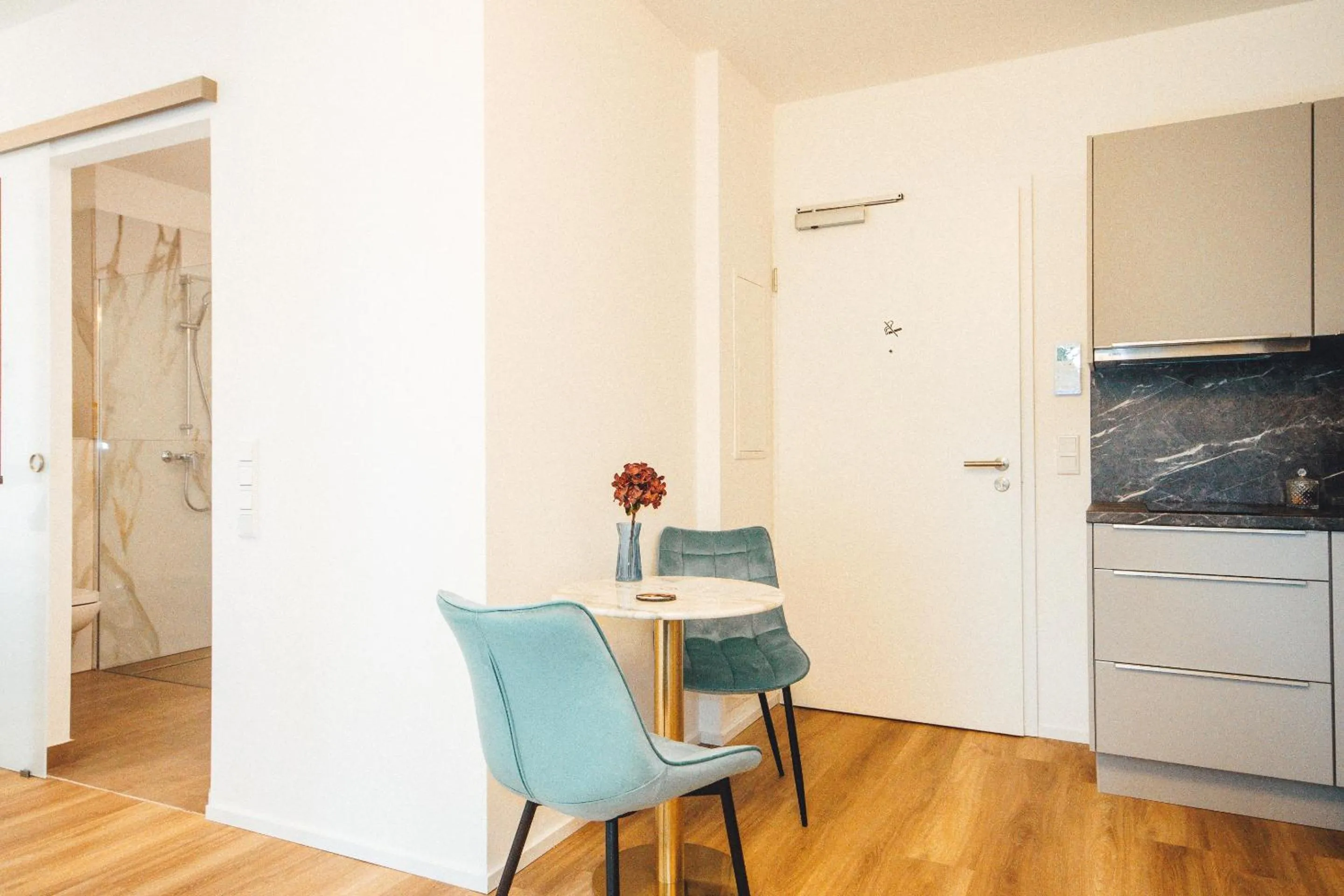 Dining area in THE WOS Apartments