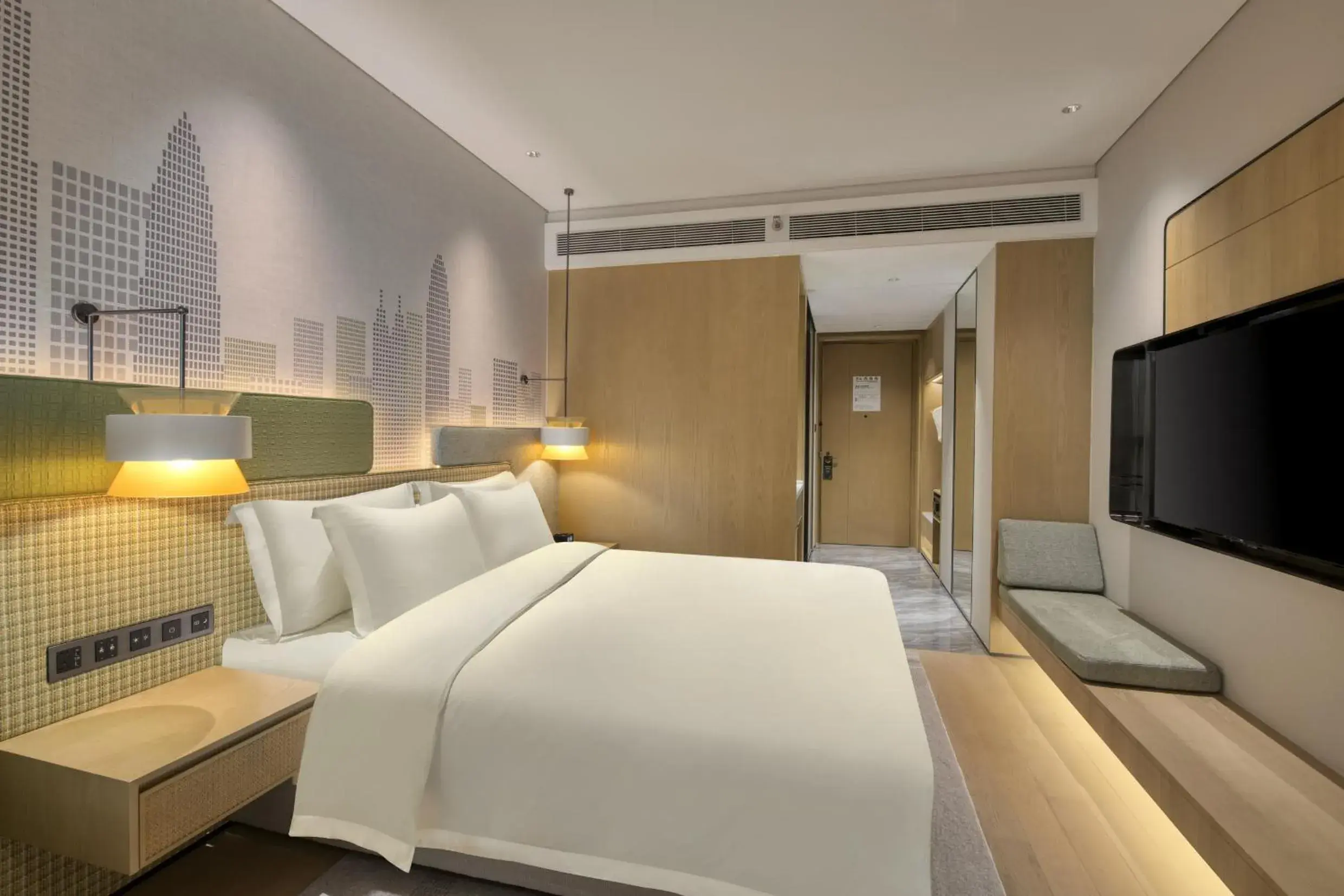 Bed in Holiday Inn Shenzhen Nanshan by IHG Bed in Holiday Inn Shenzhen Nanshan by IHG