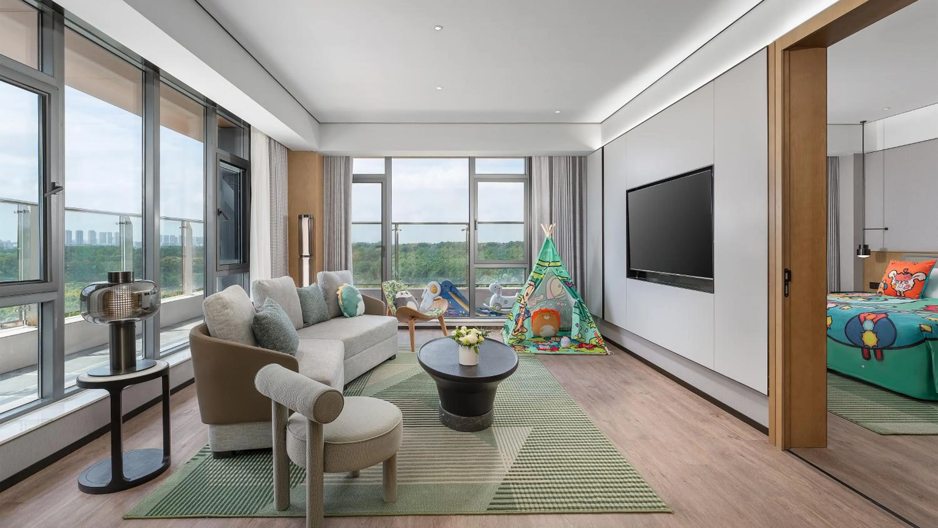 Living room in Holiday Inn Wuhan Houguan Lake by IHG
