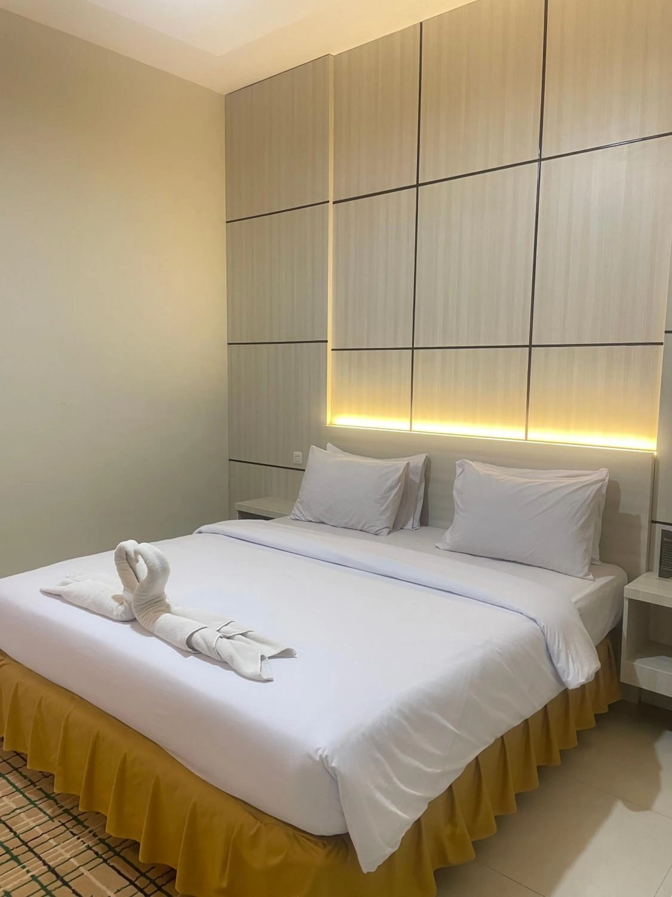 Bed in Soeltan Luxe Hotel Lampung