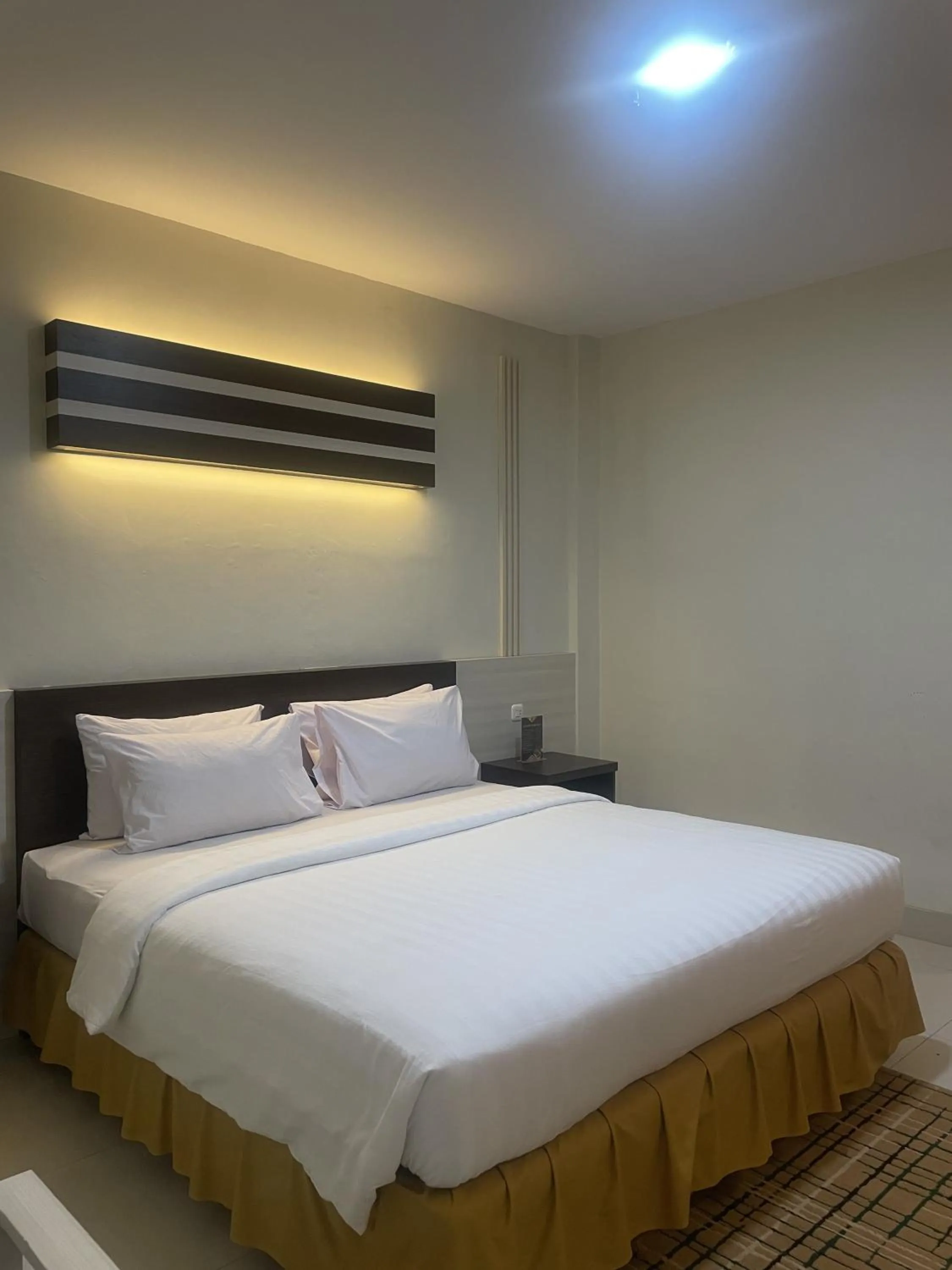 Bed in Soeltan Luxe Hotel Lampung