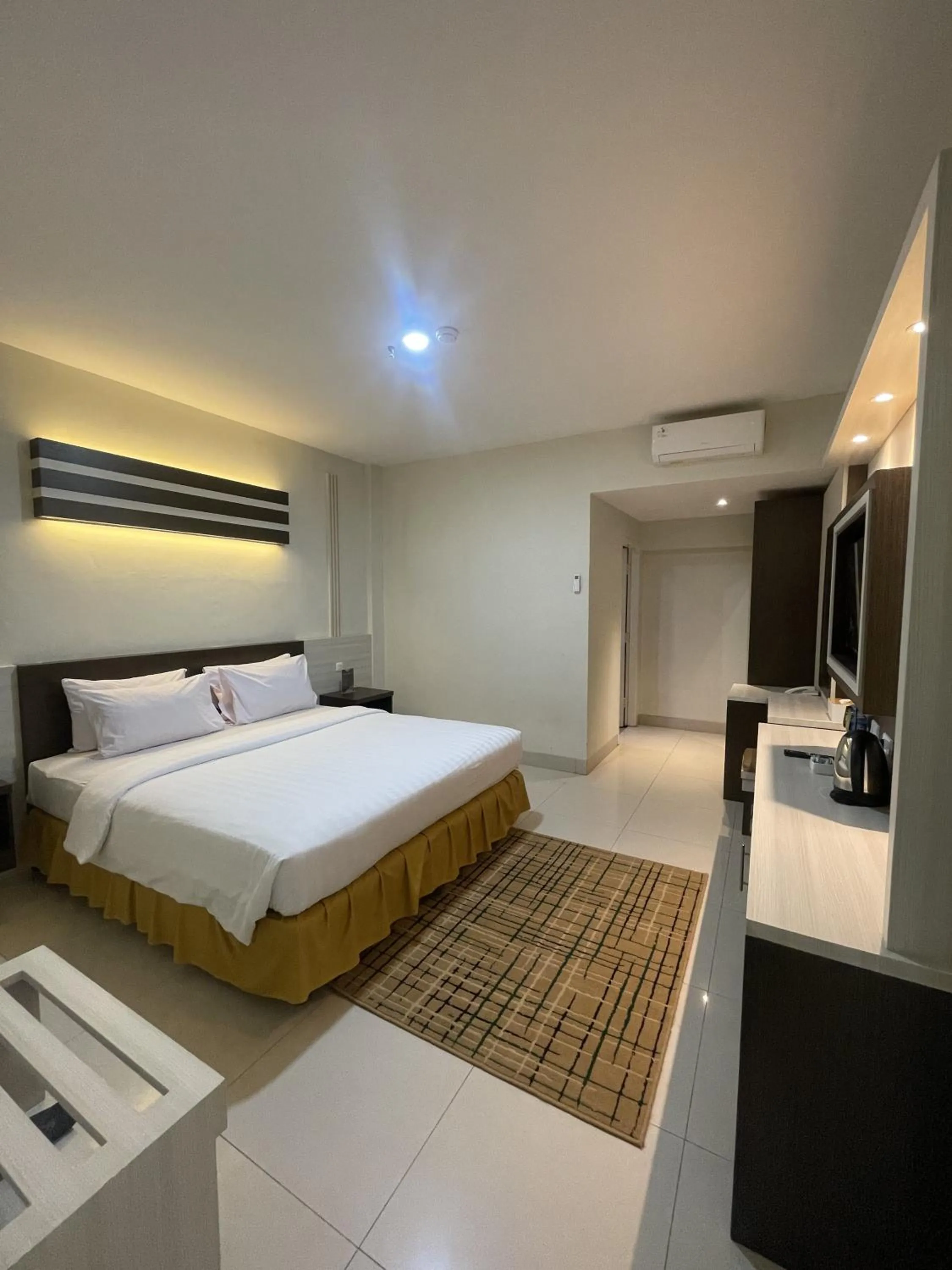 Bed in Soeltan Luxe Hotel Lampung
