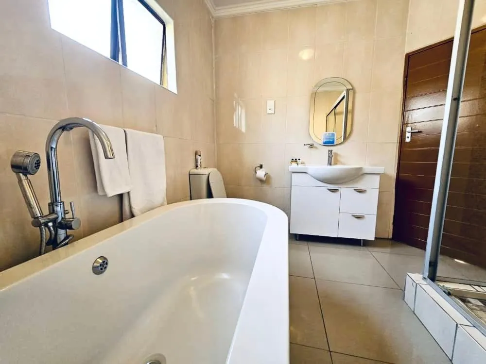 Bathroom in Maun Executive Inn