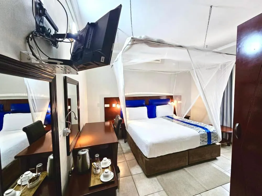 TV and multimedia, Bed in Maun Executive Inn