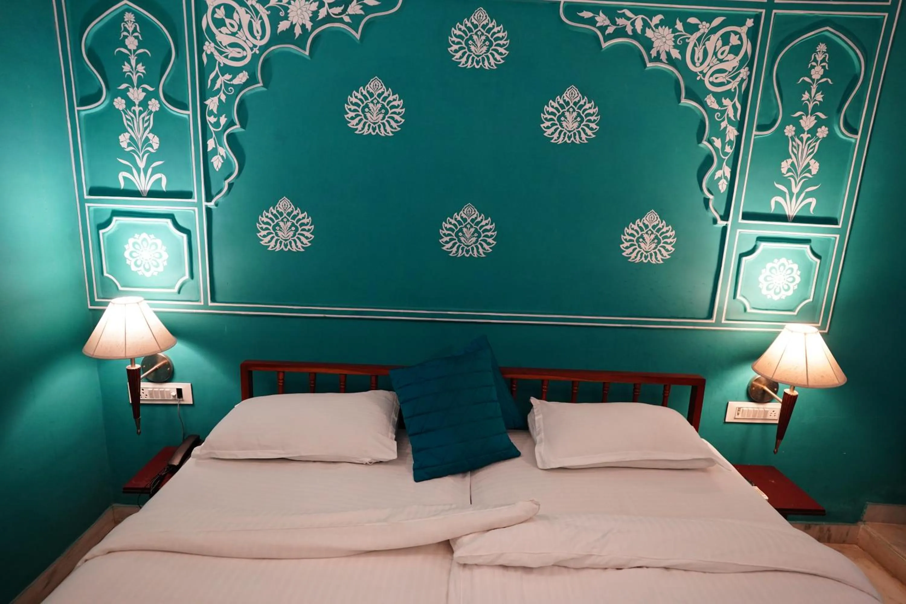 Bed in Haveli Kalwara - A Heritage Hotel