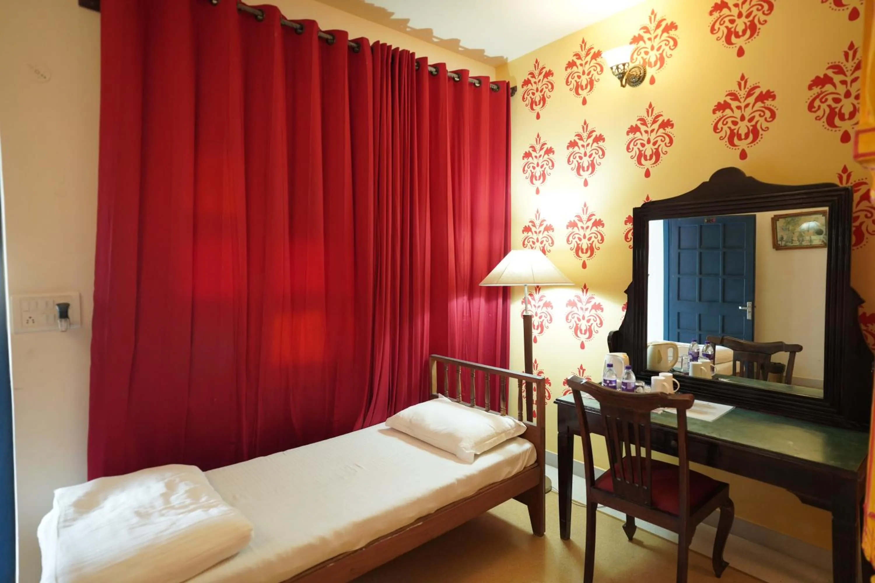 Bed in Haveli Kalwara - A Heritage Hotel