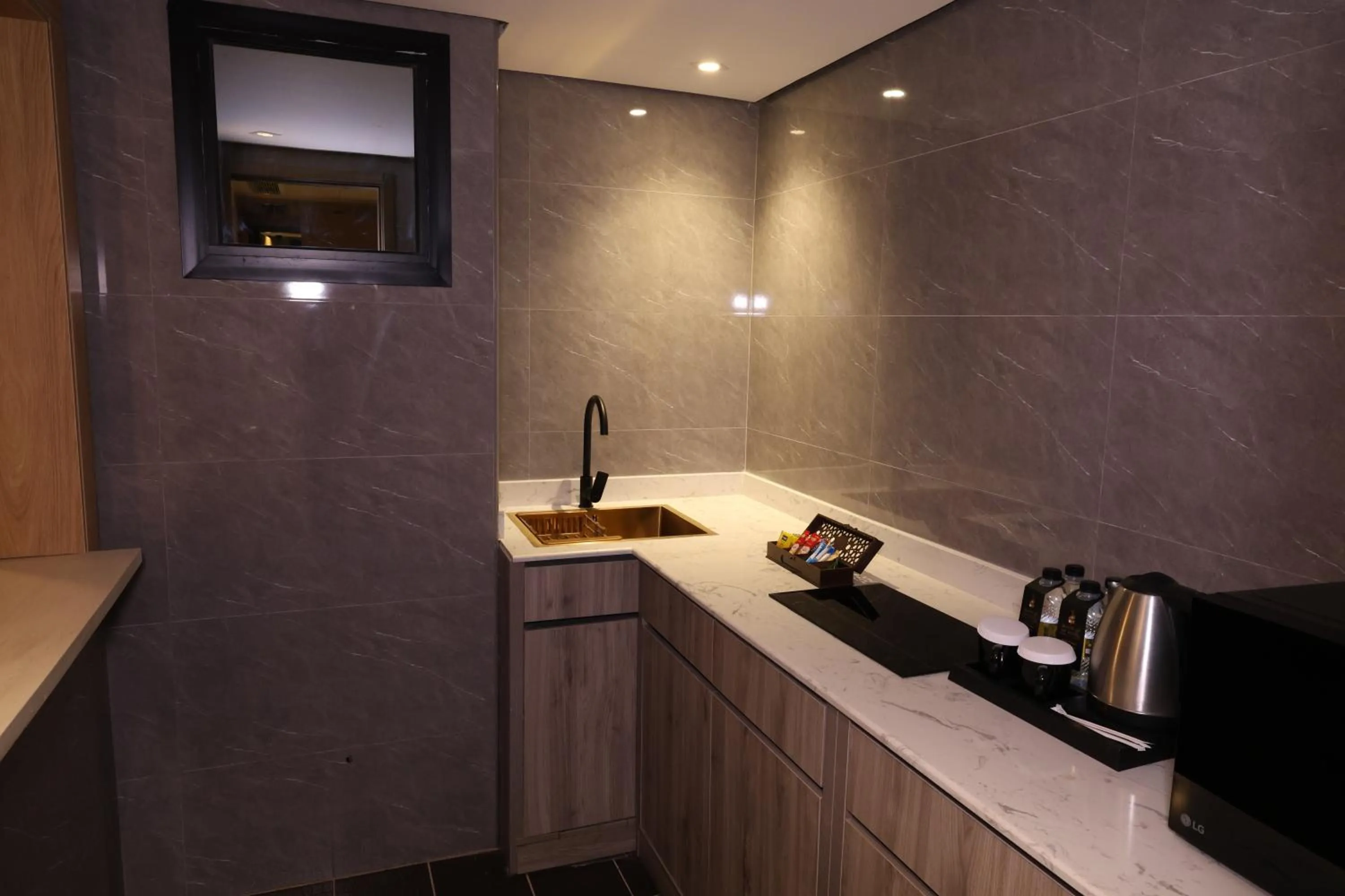 Kitchen or kitchenette in AW Hotel Riyadh