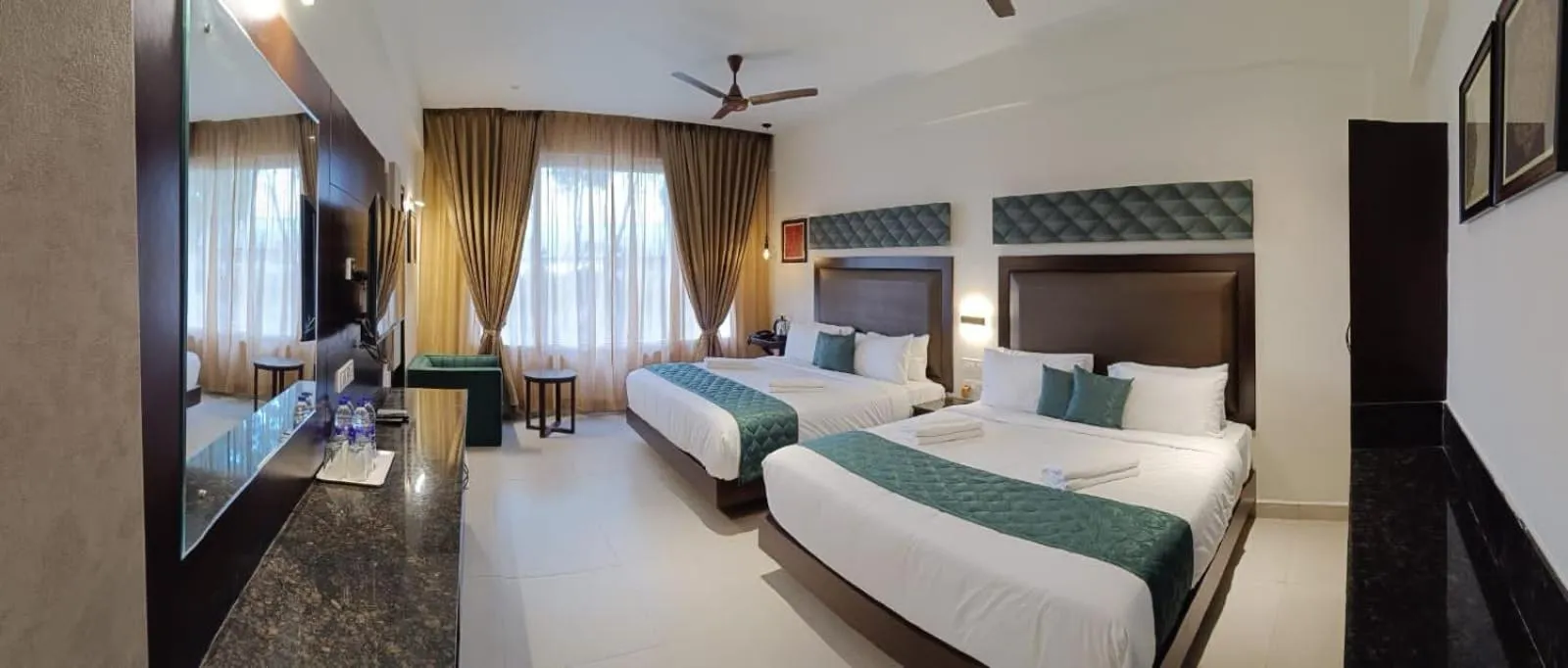 Bed in Hotel Rameswaram Grand