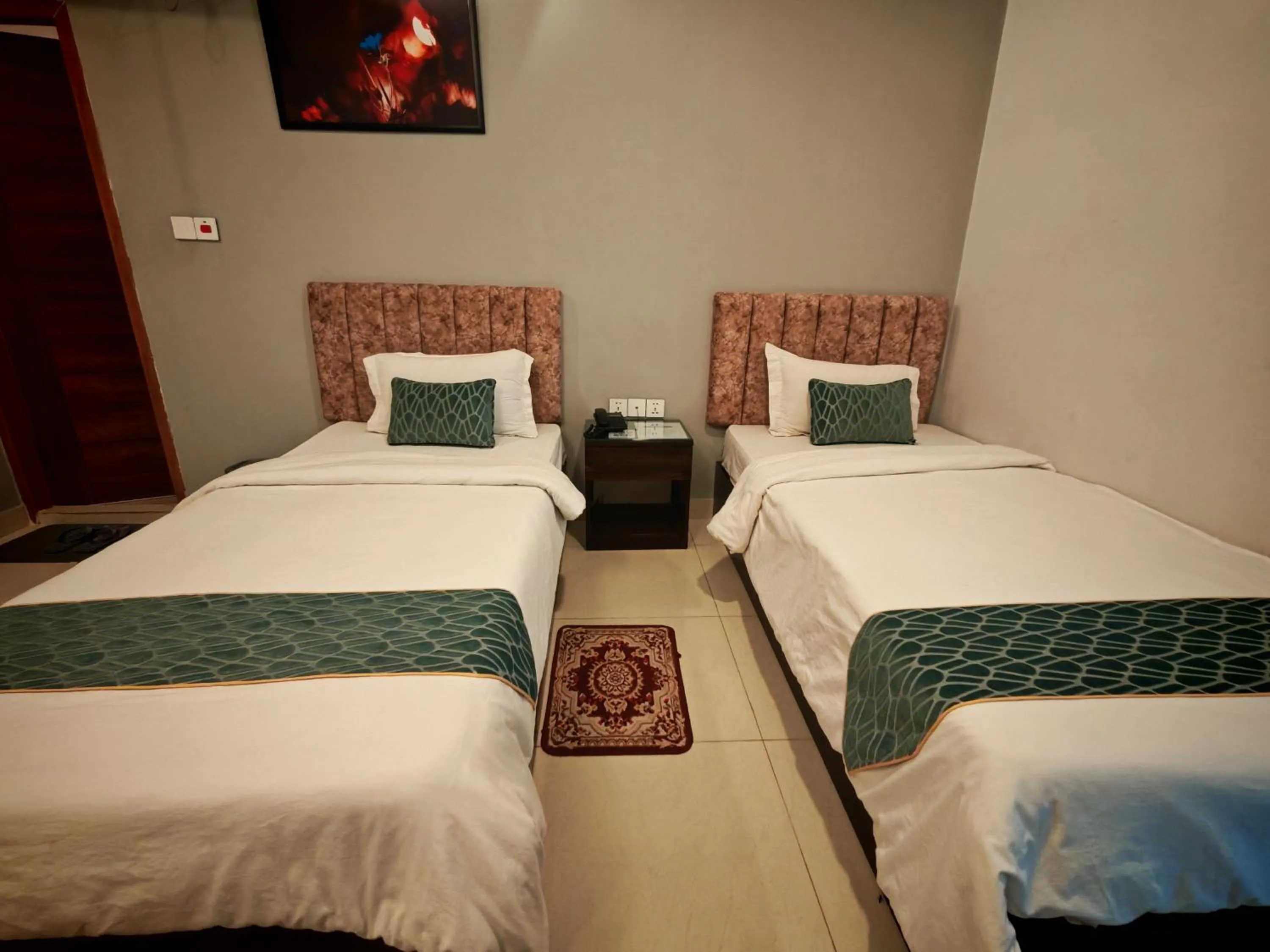 Bed in Sylhet Paradise Inn