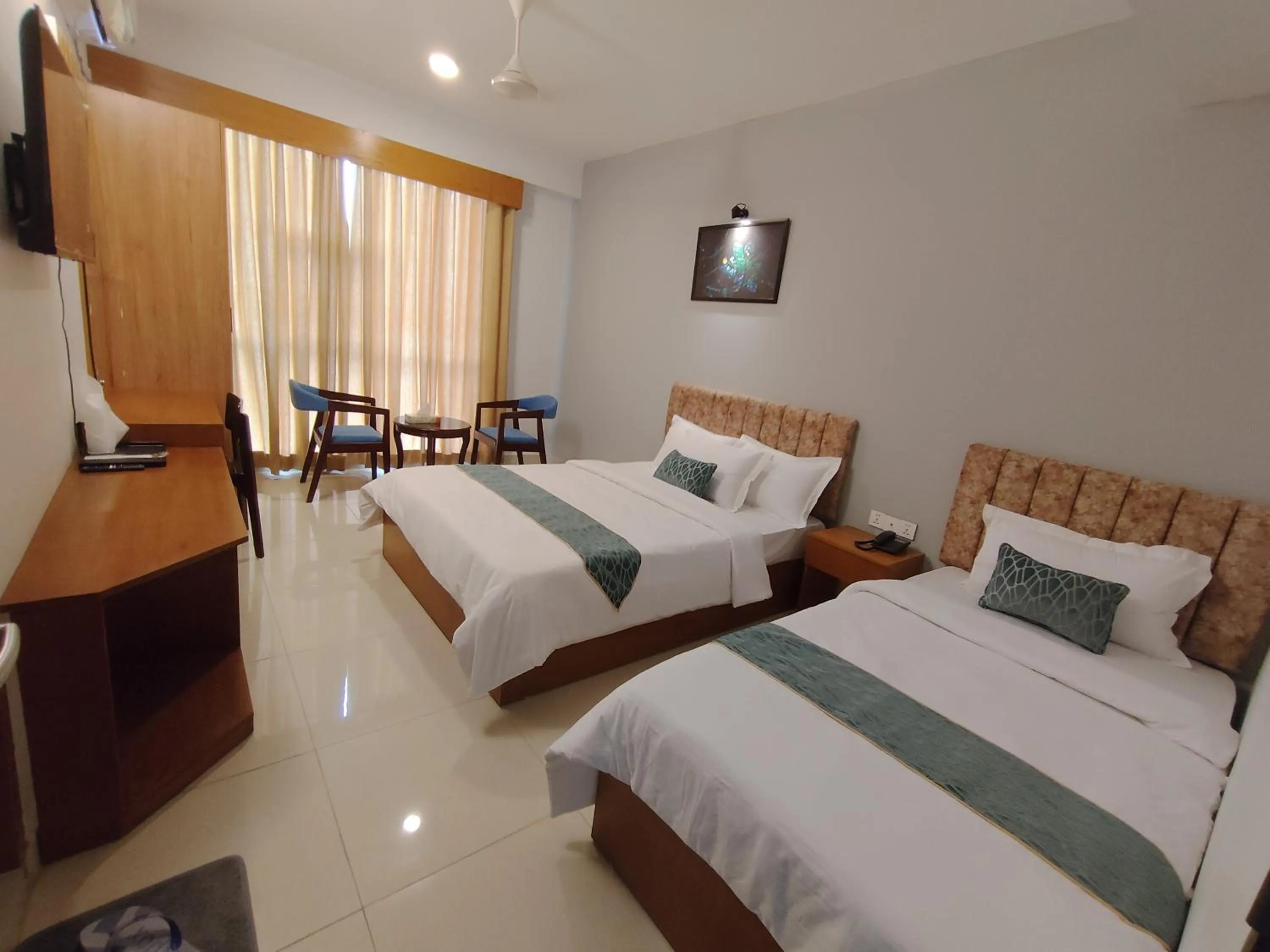 Bed in Sylhet Paradise Inn