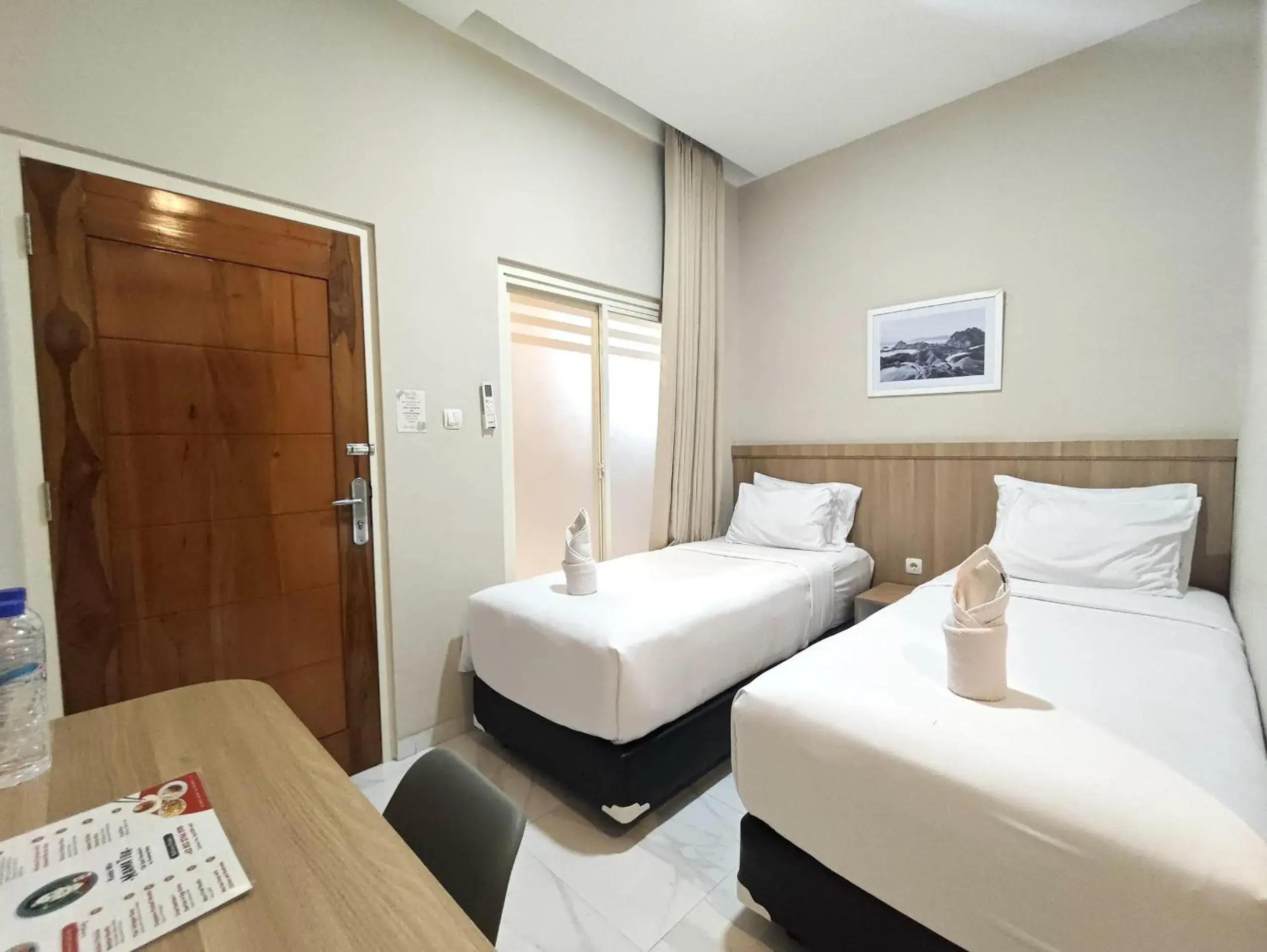 Bed in El Nipa Hotel Labuan Bajo Bed in El Nipa Hotel Labuan Bajo