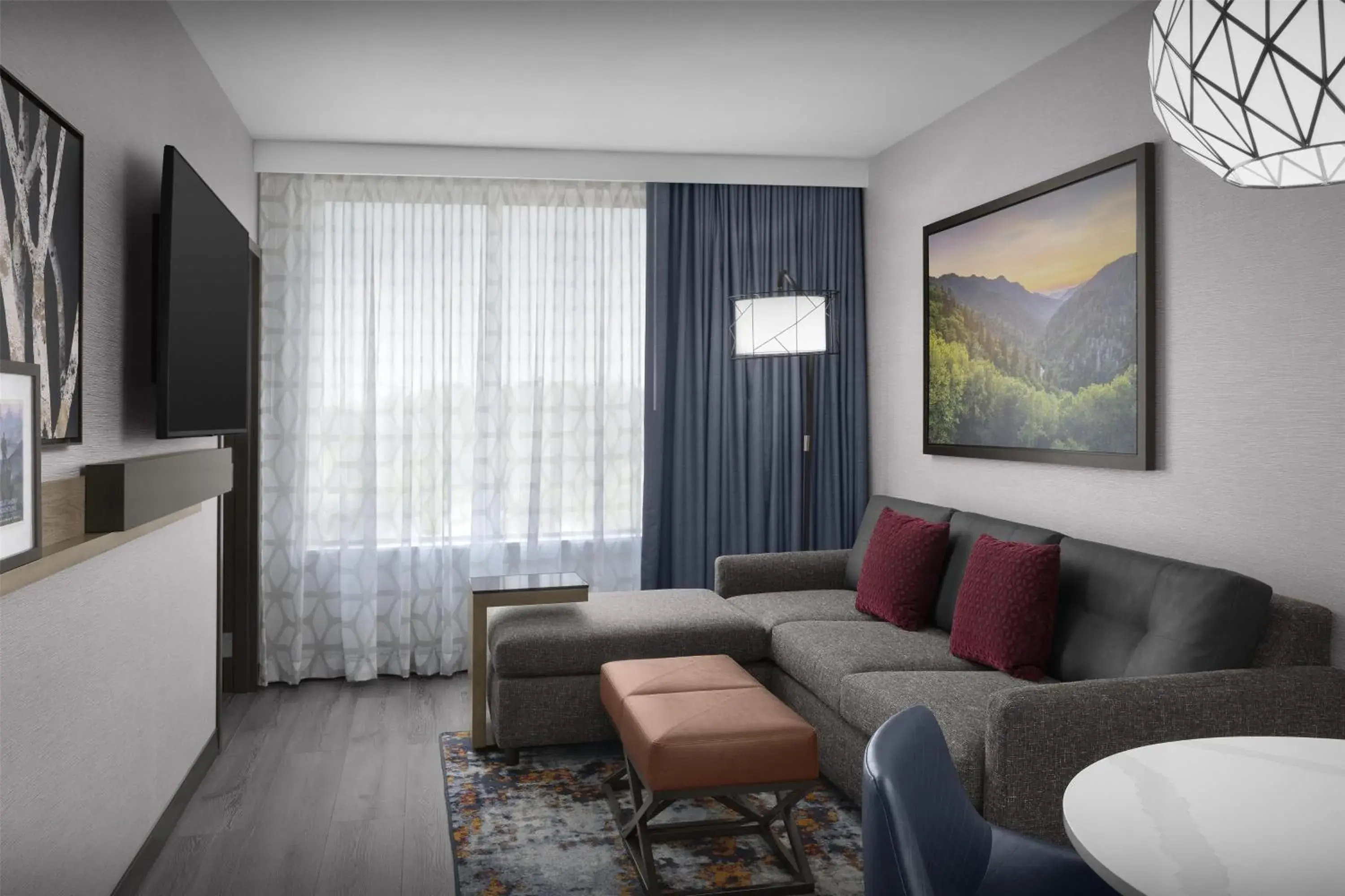 Living room in Embassy Suites By Hilton Pigeon Forge Resort Living room in Embassy Suites By Hilton Pigeon Forge Resort