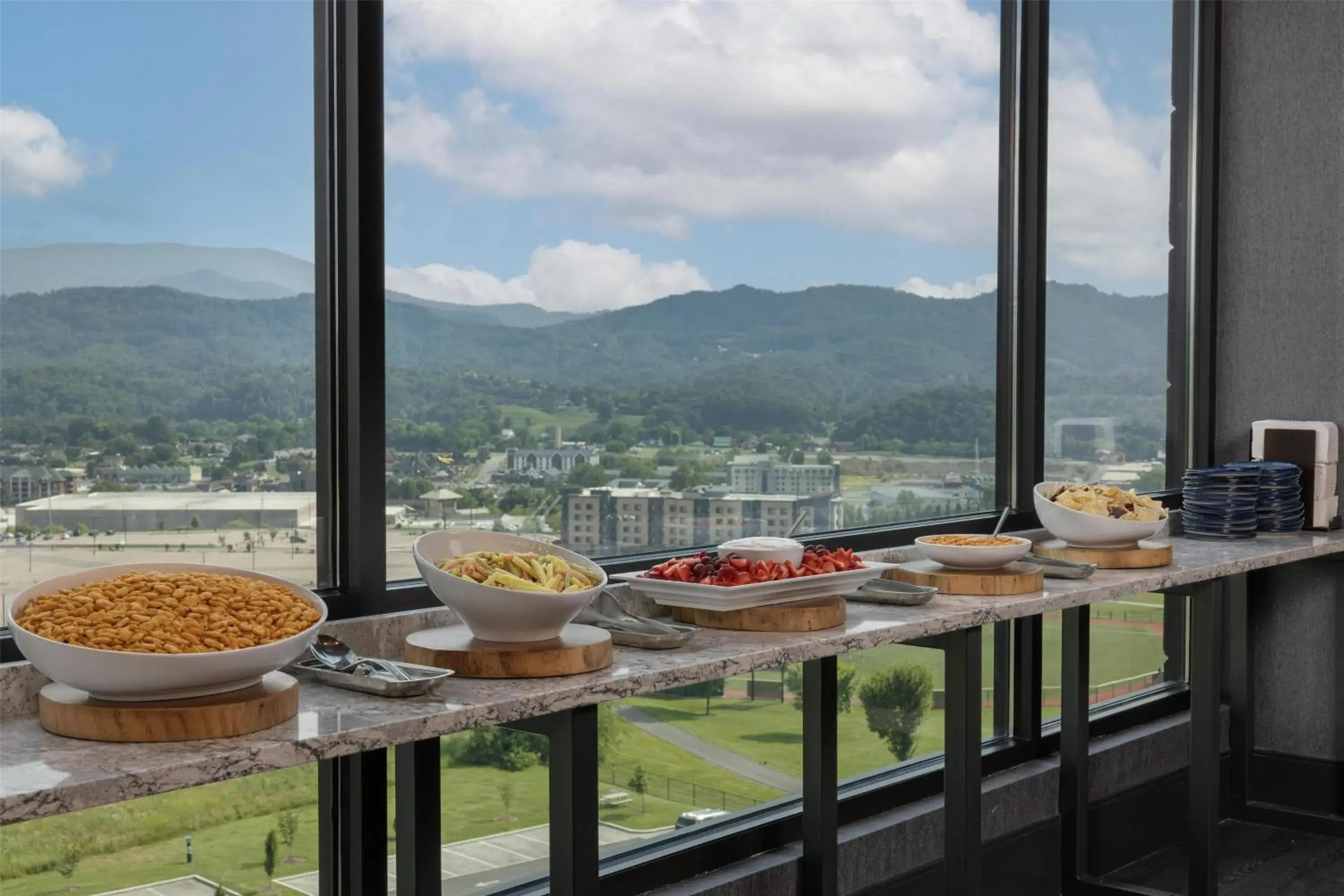 Dining area in Embassy Suites By Hilton Pigeon Forge Resort Dining area in Embassy Suites By Hilton Pigeon Forge Resort
