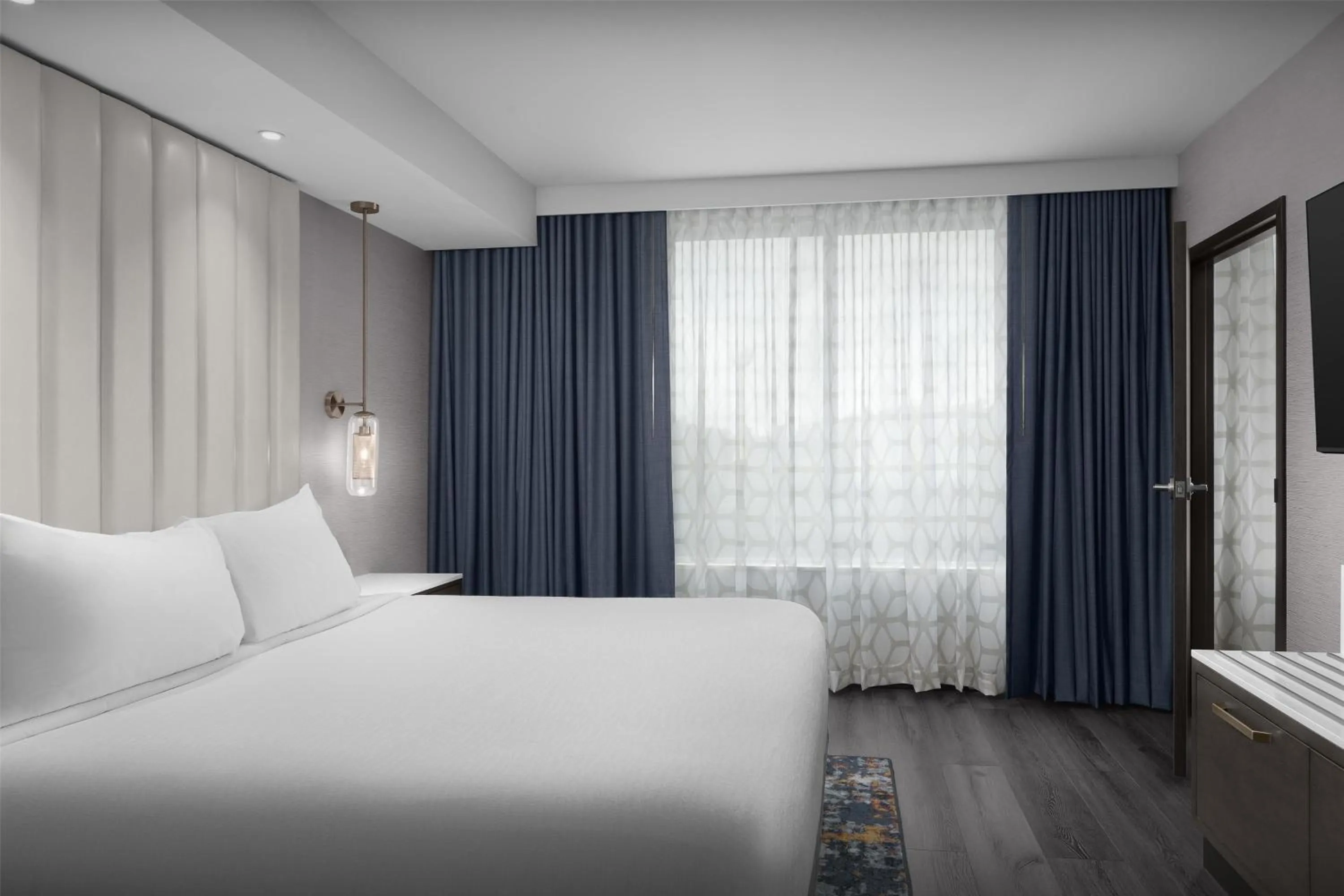 Bed in Embassy Suites By Hilton Pigeon Forge Resort