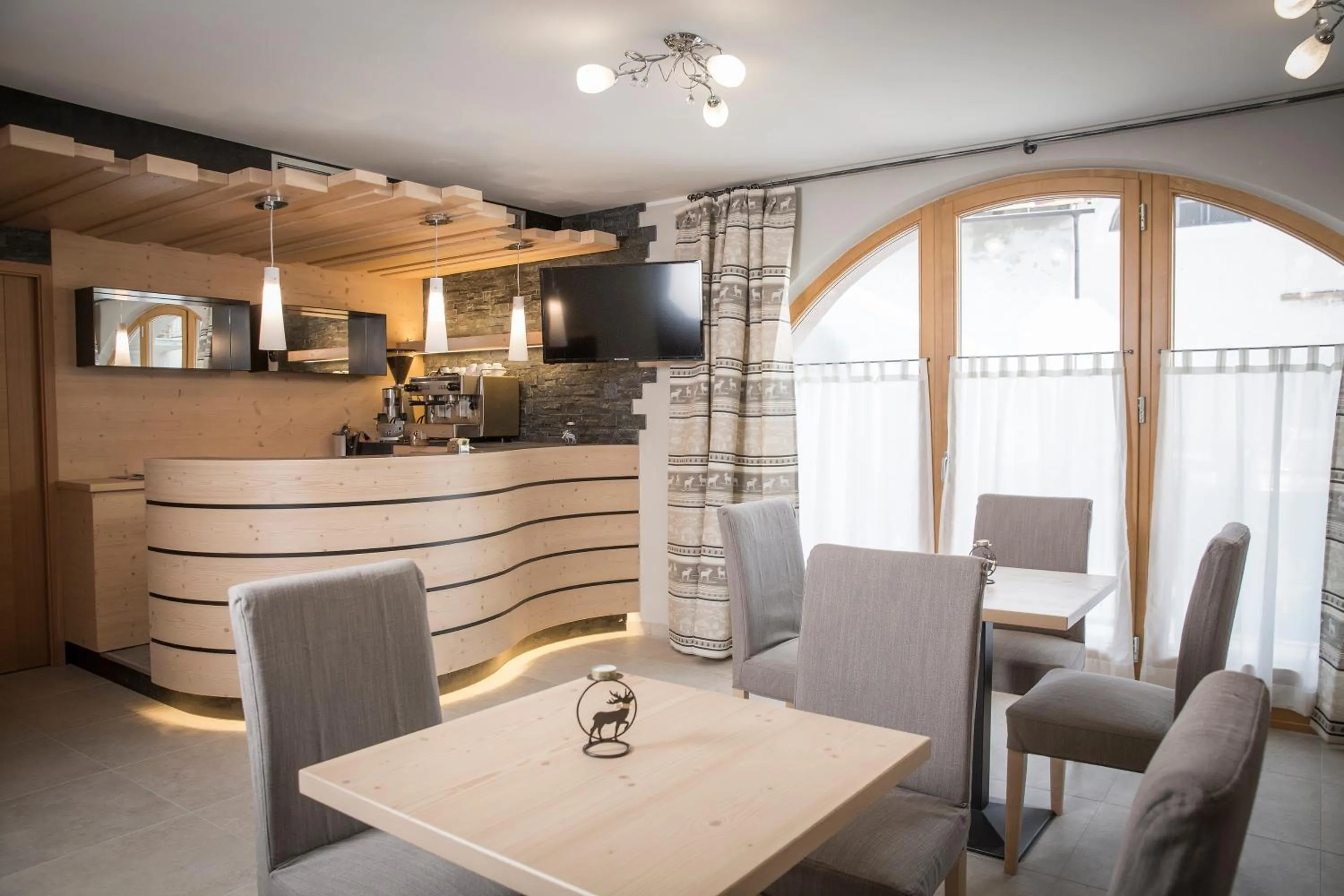 Lounge or bar in Aparthotel Dolomites Living&Relax