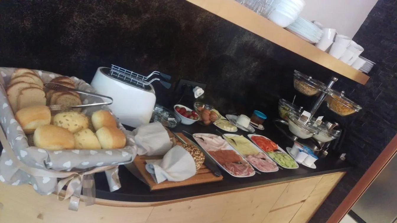 Buffet breakfast in Aparthotel Dolomites Living&Relax