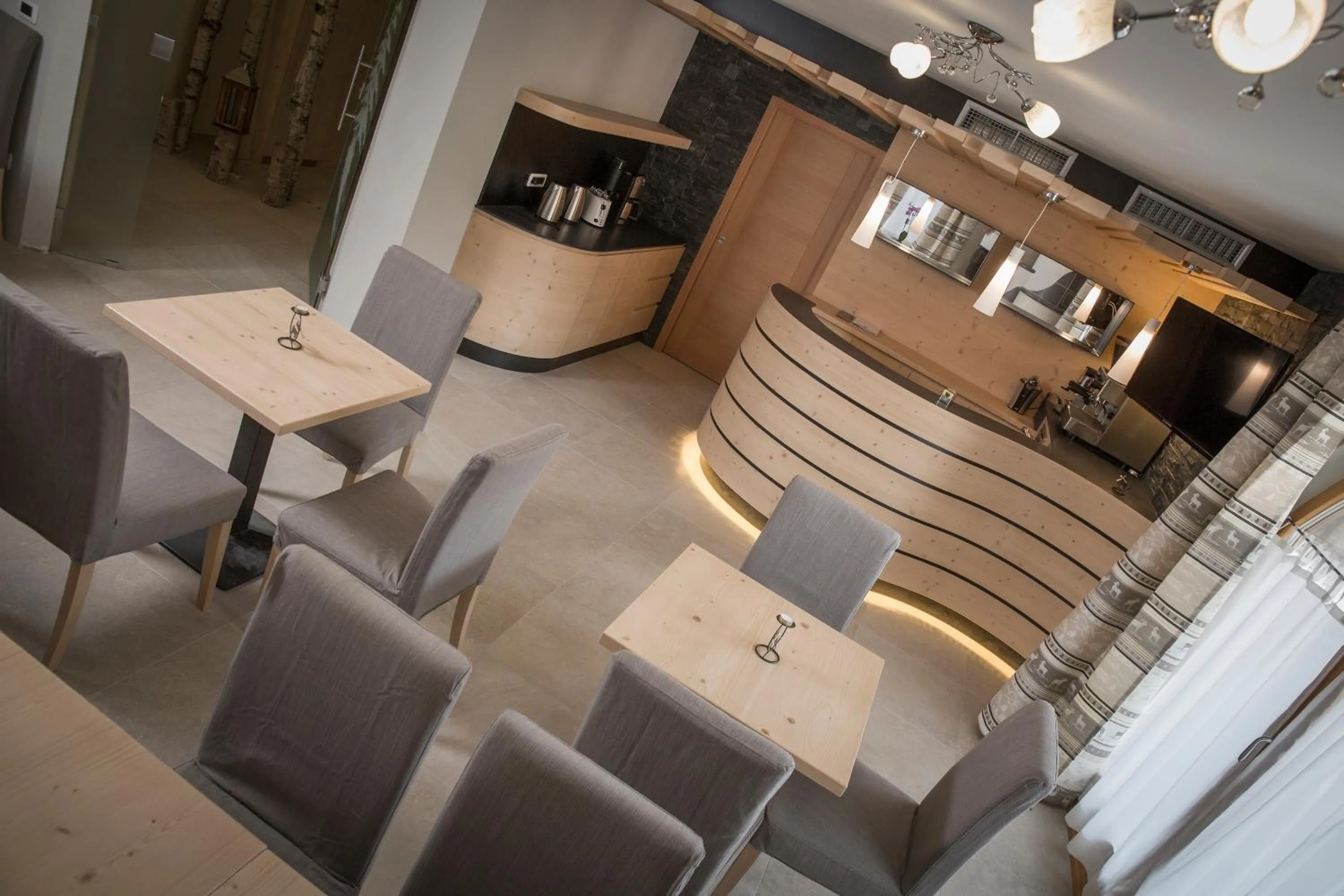 Lounge or bar in Aparthotel Dolomites Living&Relax