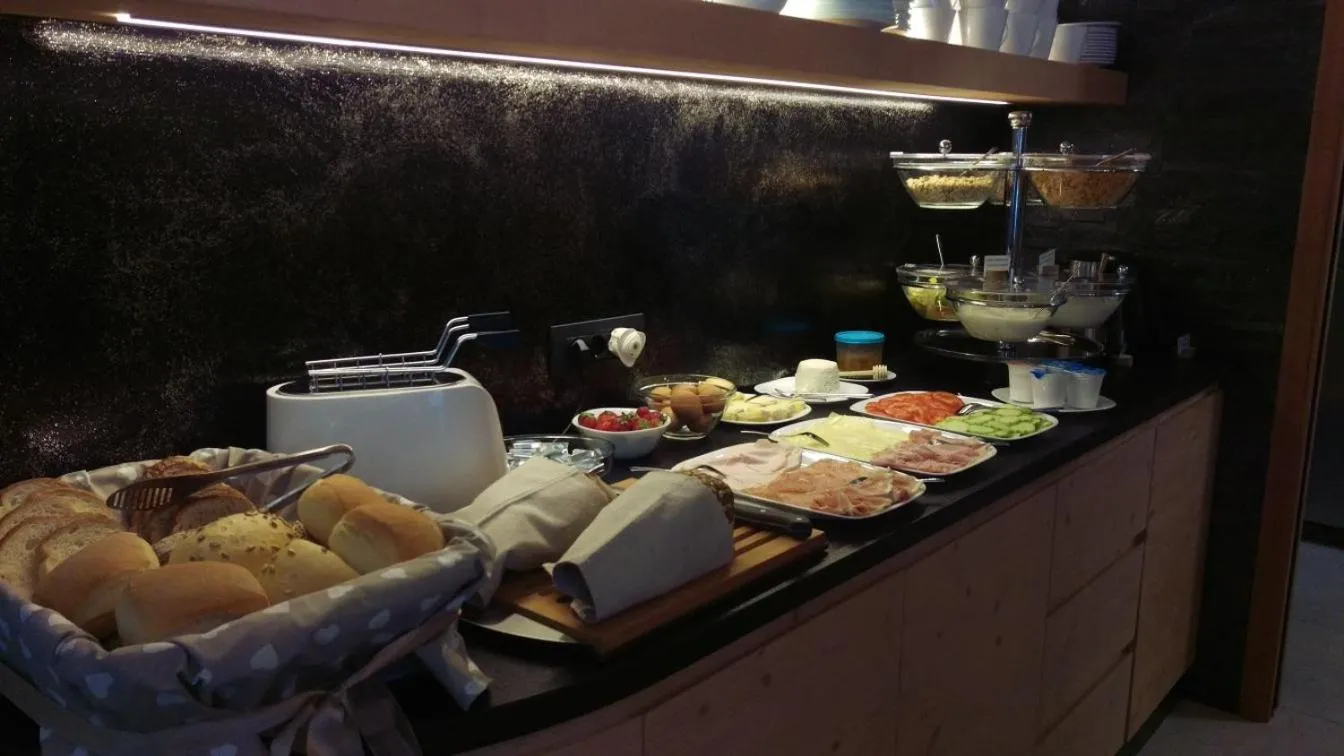 Buffet breakfast in Aparthotel Dolomites Living&Relax