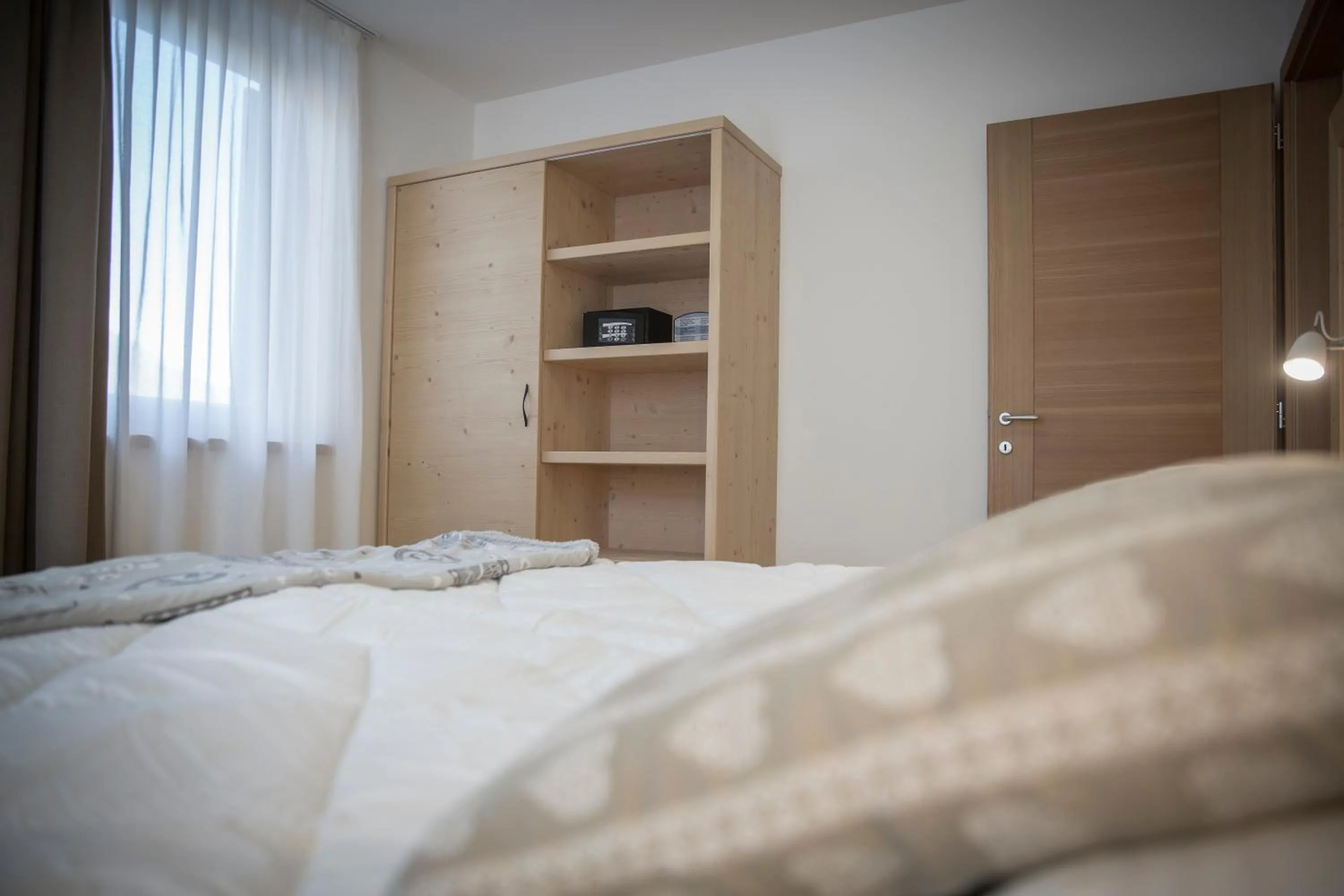 Photo of the whole room, Bed in Aparthotel Dolomites Living&Relax