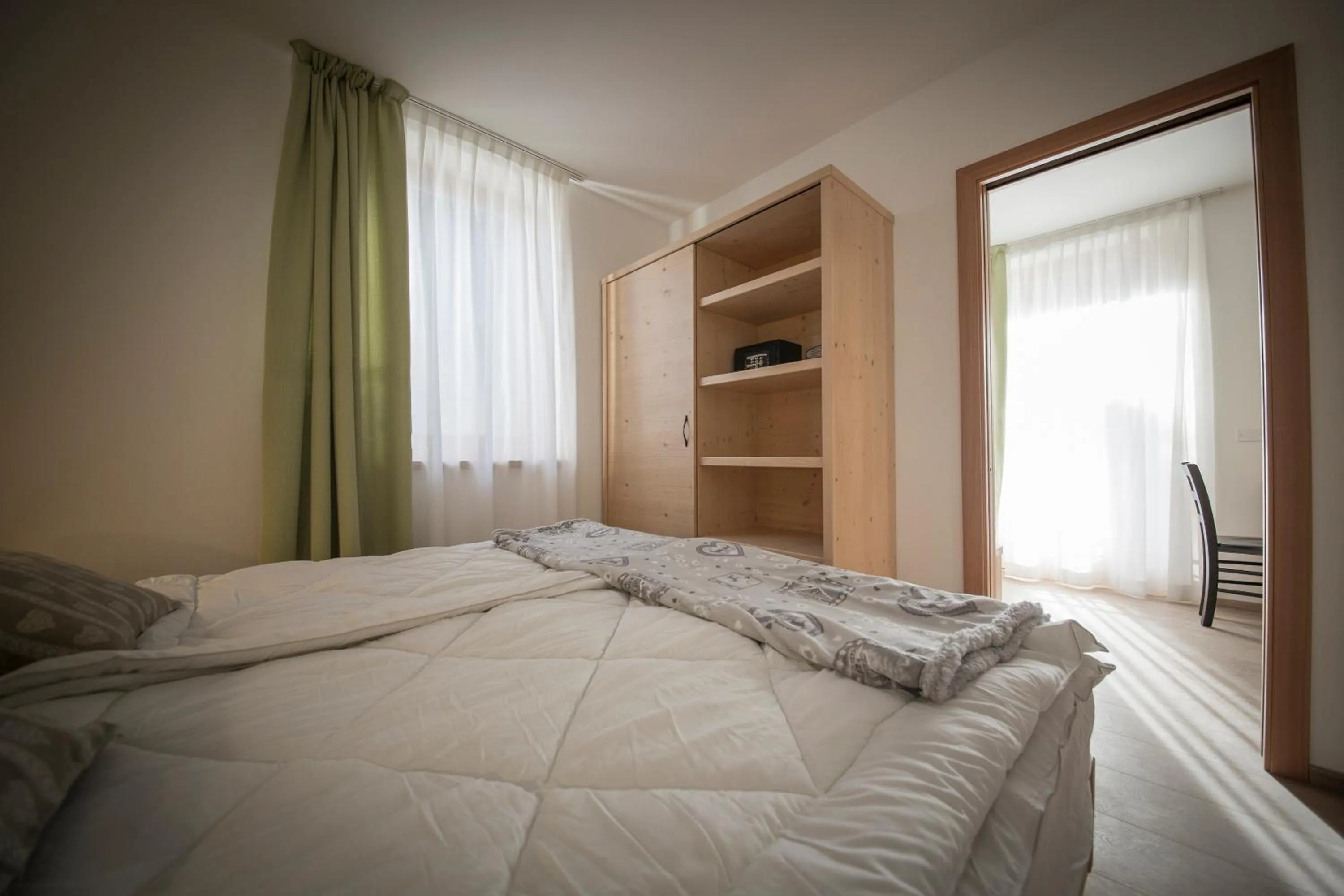 Photo of the whole room, Bed in Aparthotel Dolomites Living&Relax