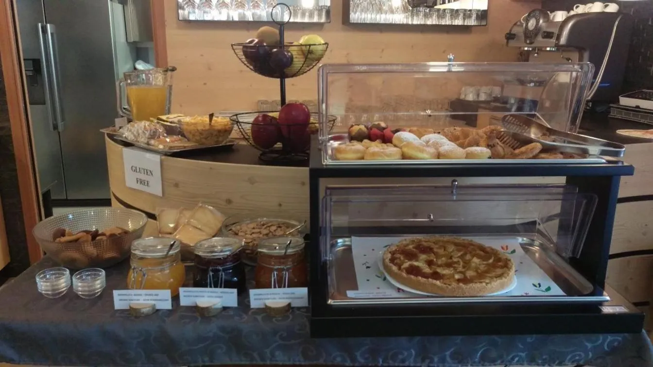 Buffet breakfast in Aparthotel Dolomites Living&Relax