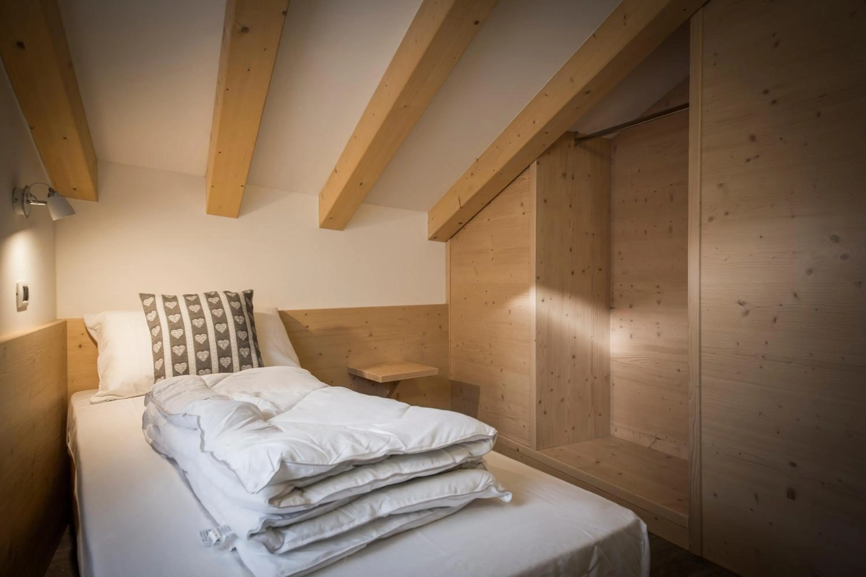 Bed in Aparthotel Dolomites Living&Relax