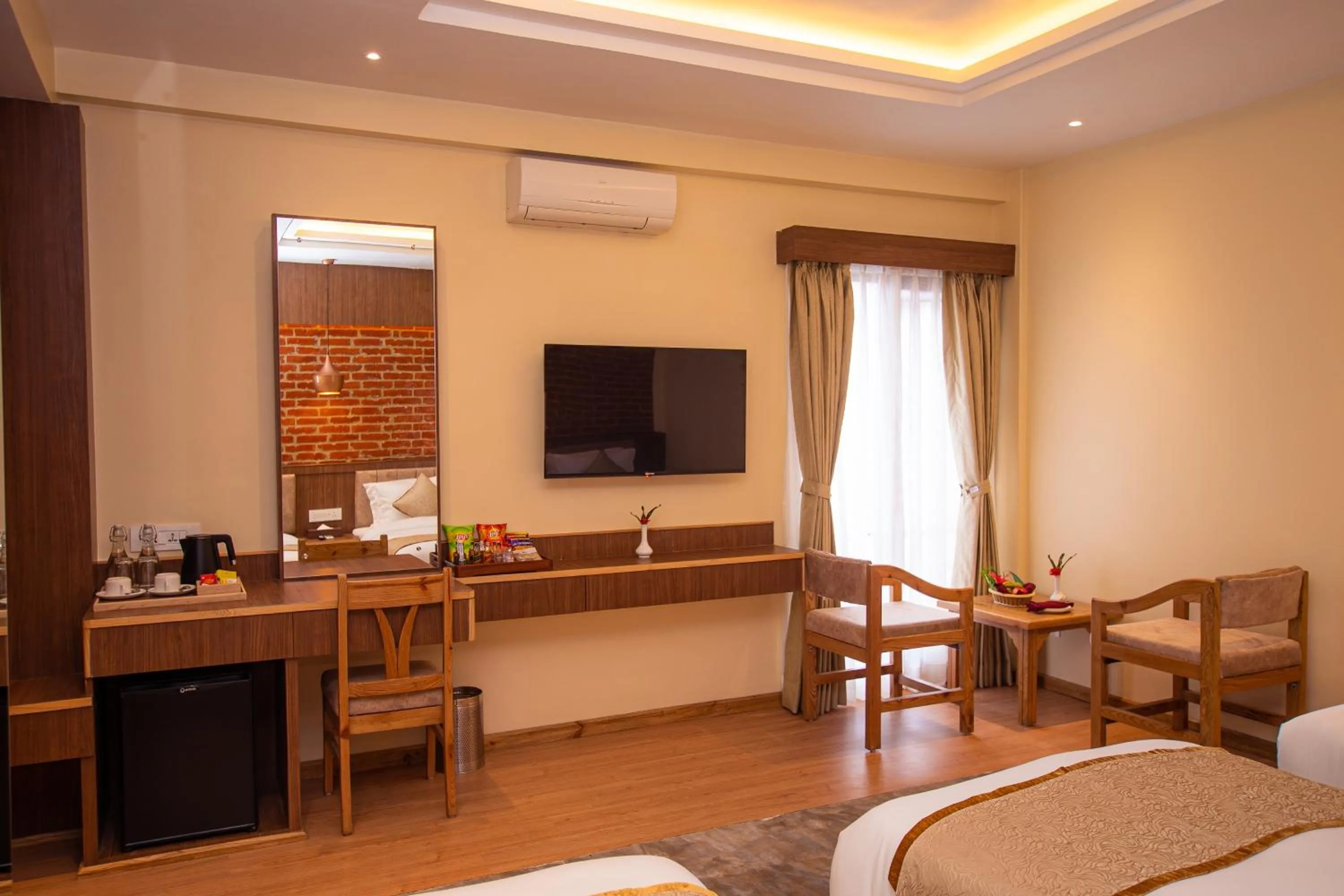 TV and multimedia in Temple Himalaya Hotel & Spa