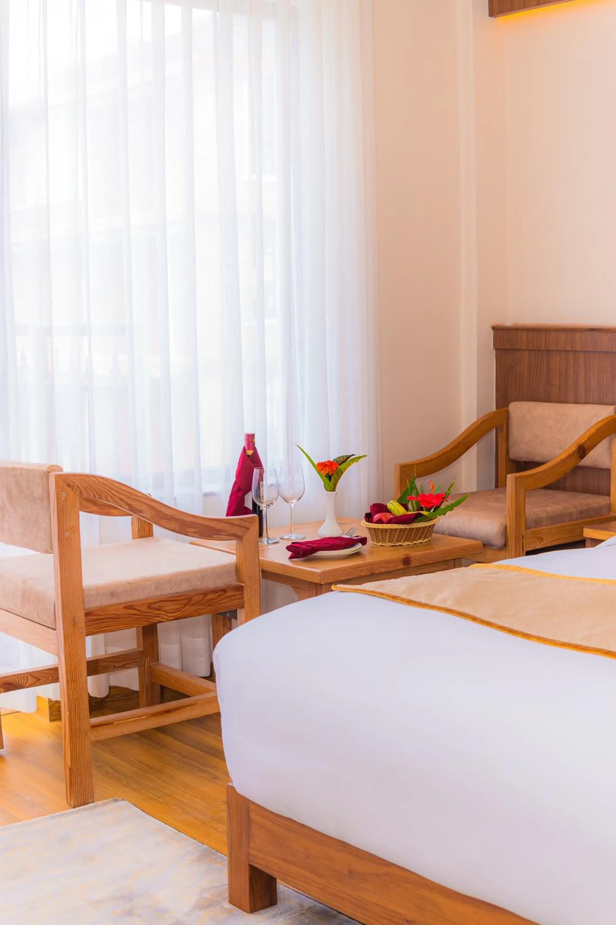 Seating area, Bed in Temple Himalaya Hotel & Spa