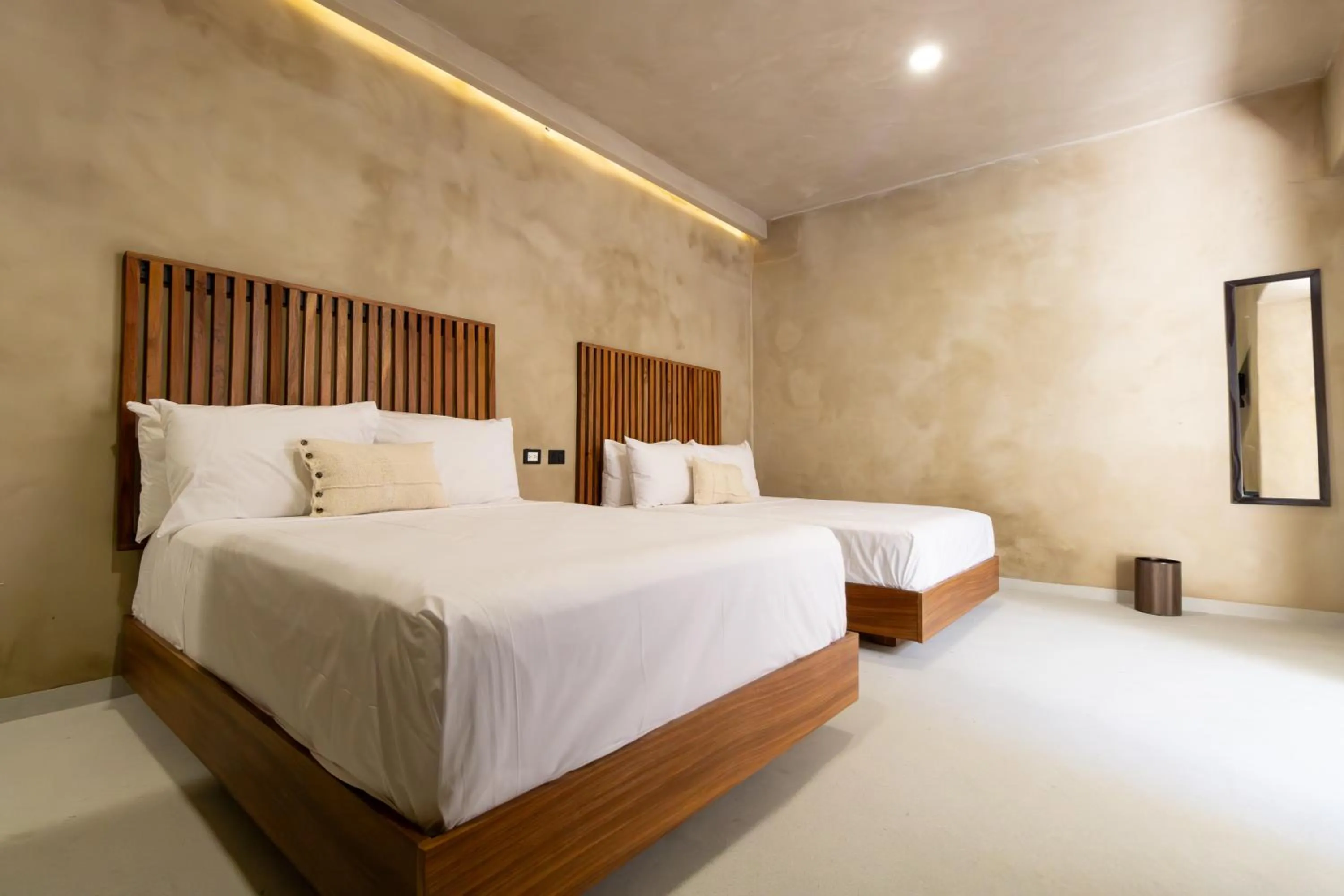 Bed in Casa Arkana Zicatela by Grupo Amber