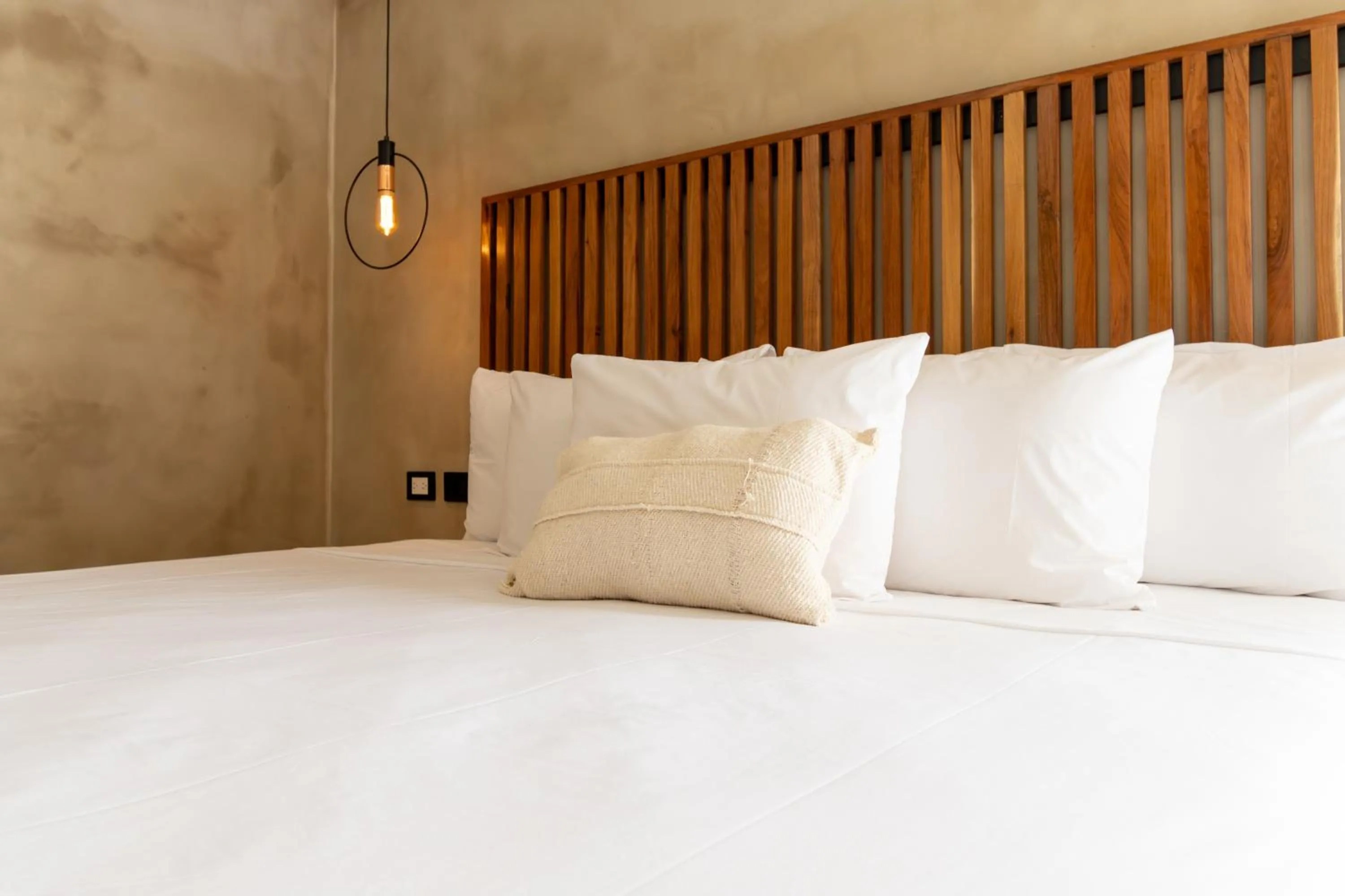 Bed in Casa Arkana Zicatela by Grupo Amber