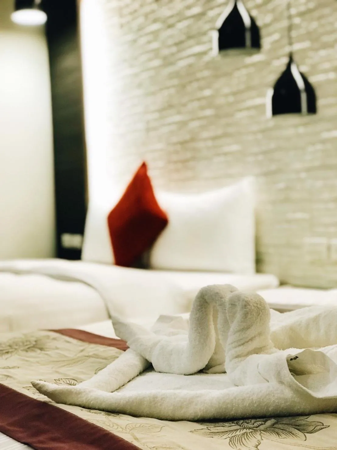 towels, Bed in Bai Sha Tan Cottage