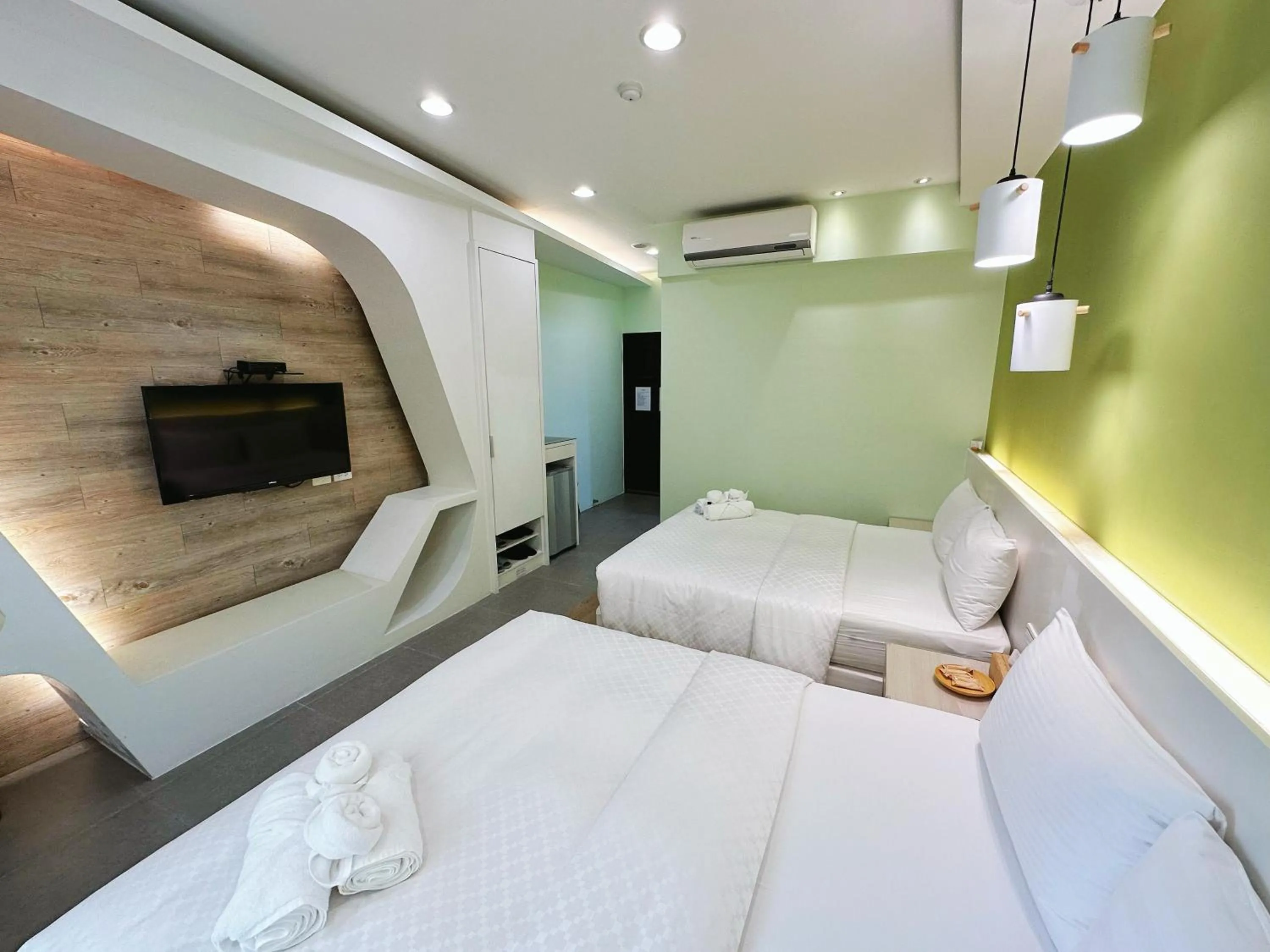 Bed in Bai Sha Tan Cottage