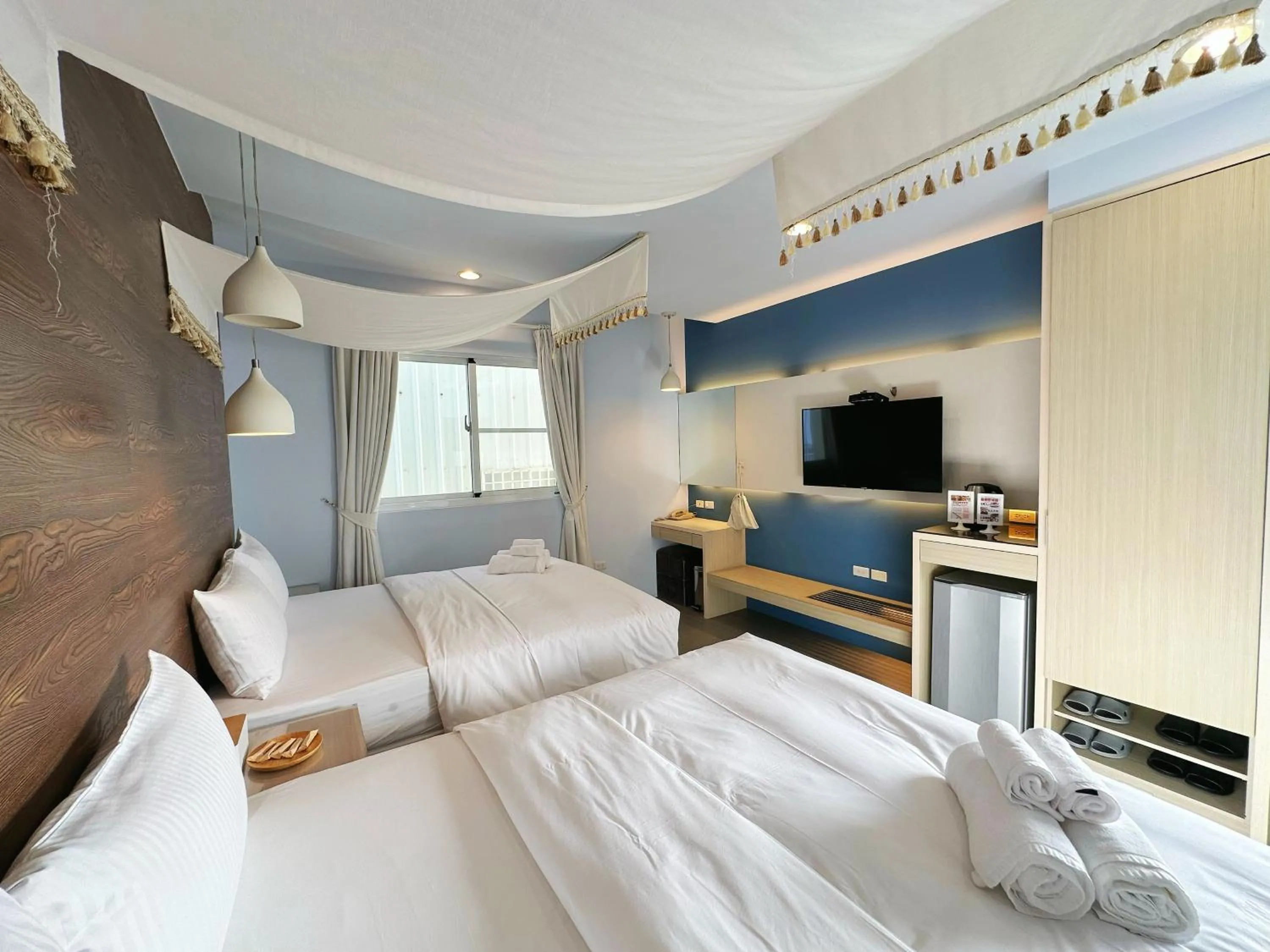 Bed in Bai Sha Tan Cottage