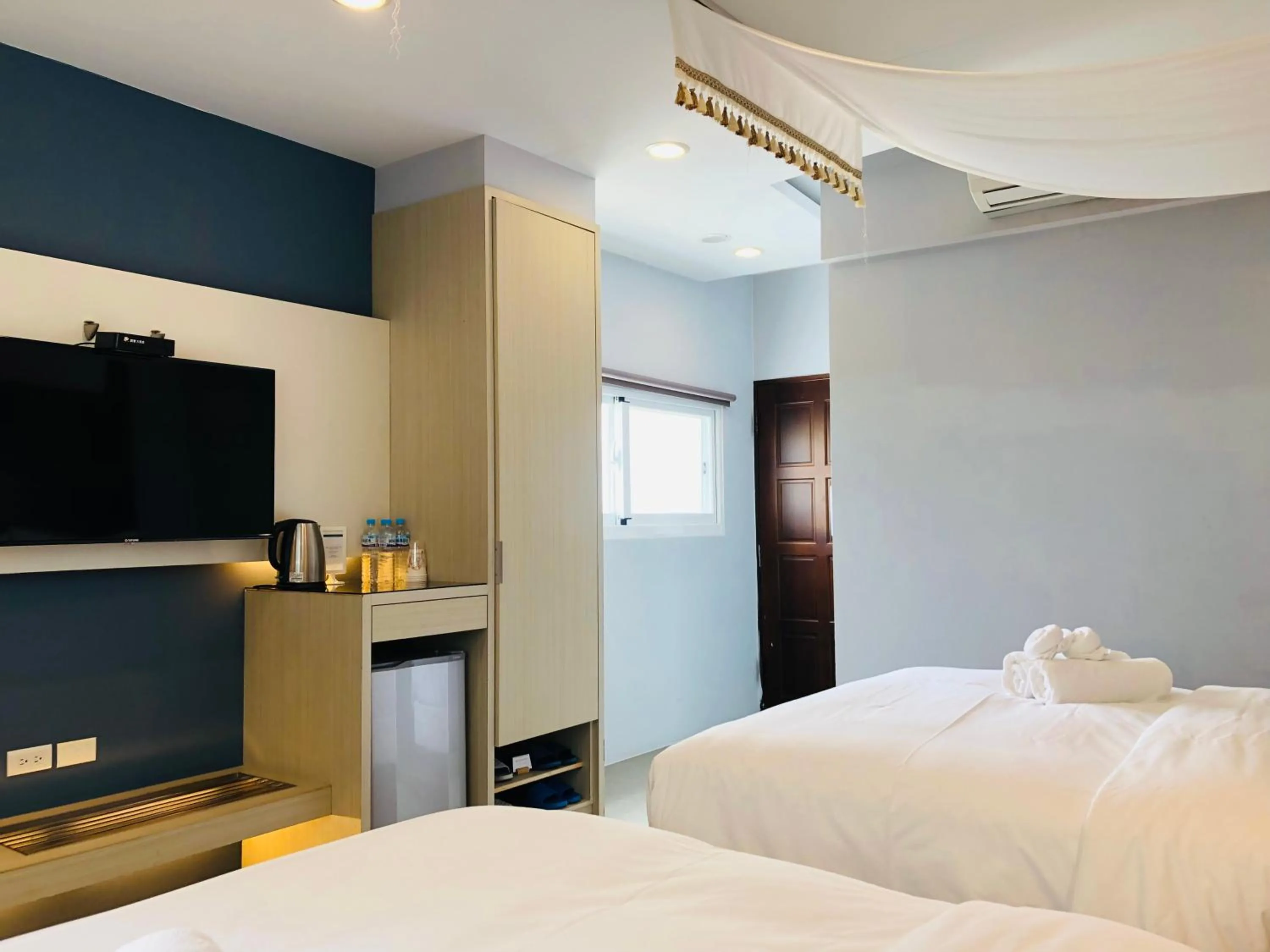 TV and multimedia, Bed in Bai Sha Tan Cottage
