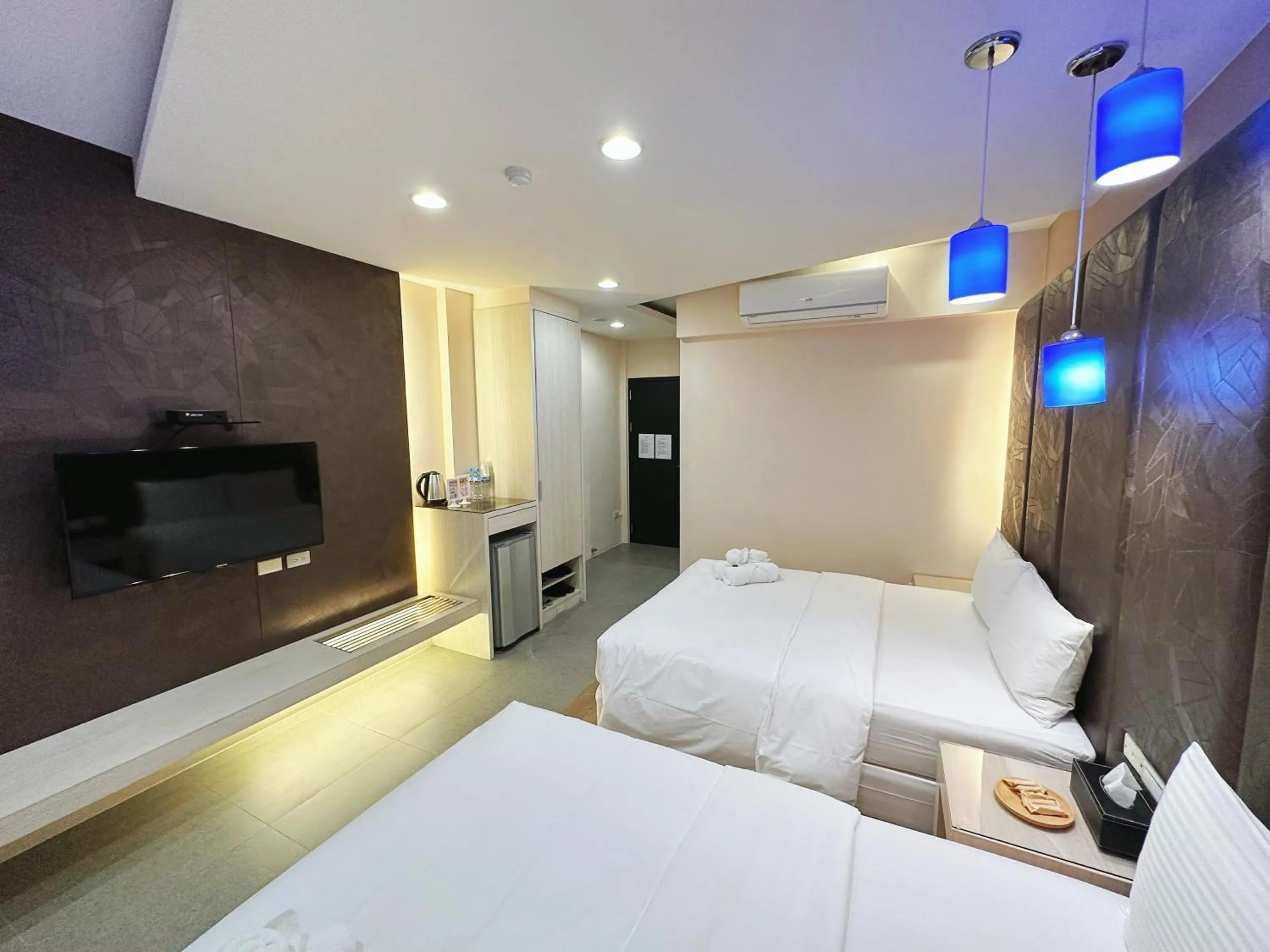 Bed in Bai Sha Tan Cottage