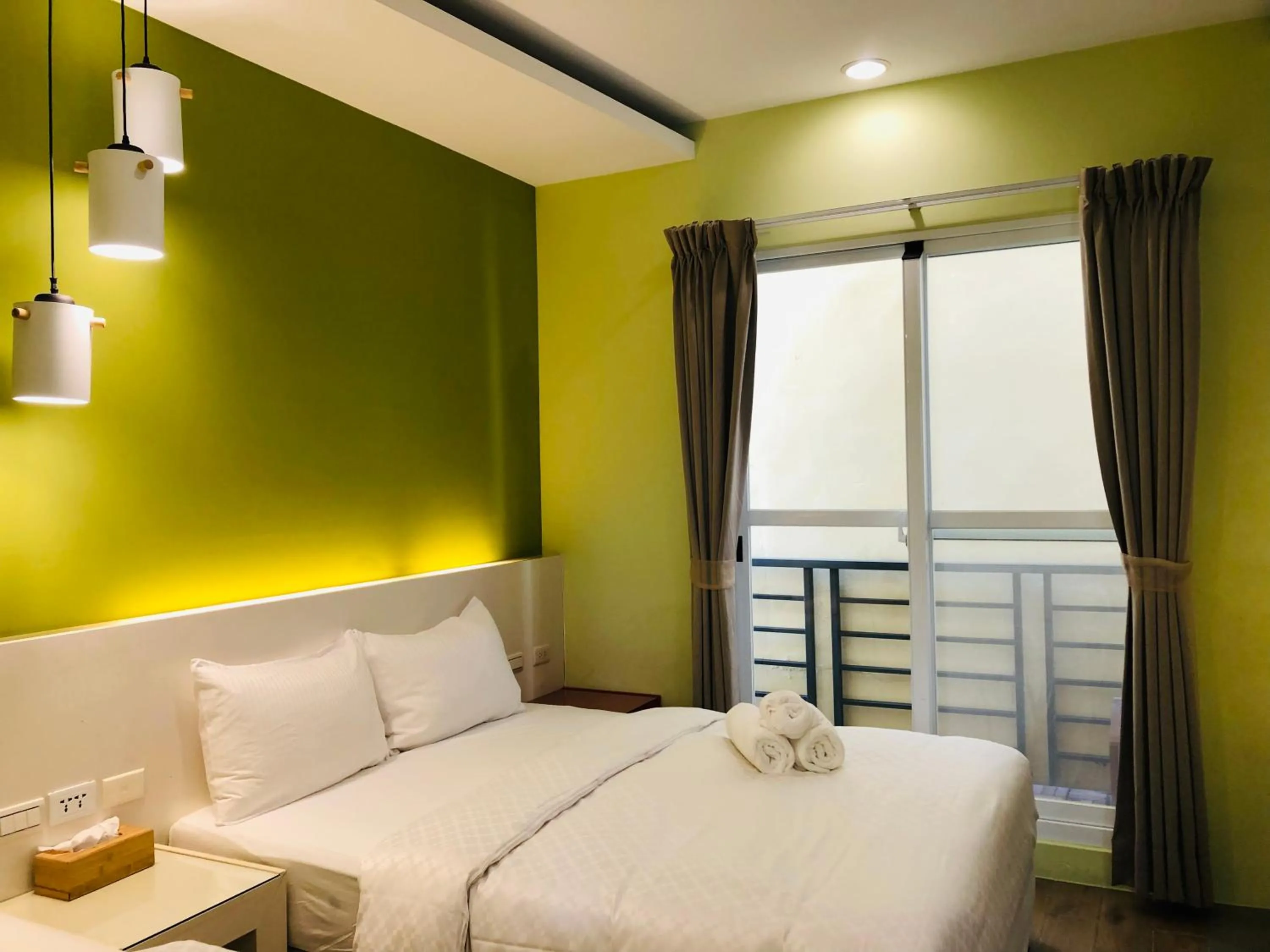 Photo of the whole room, Bed in Bai Sha Tan Cottage