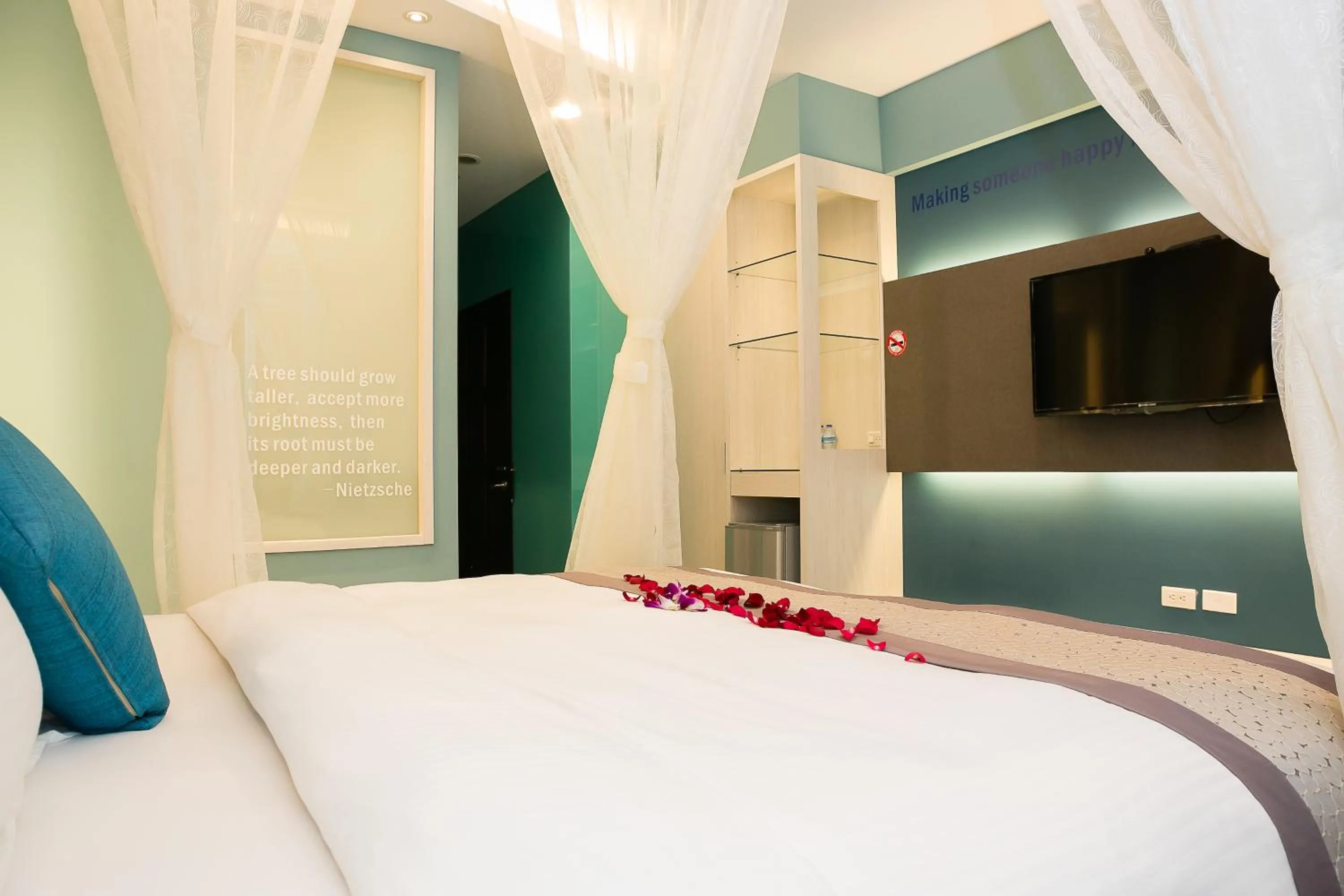 TV and multimedia, Bed in Bai Sha Tan Cottage