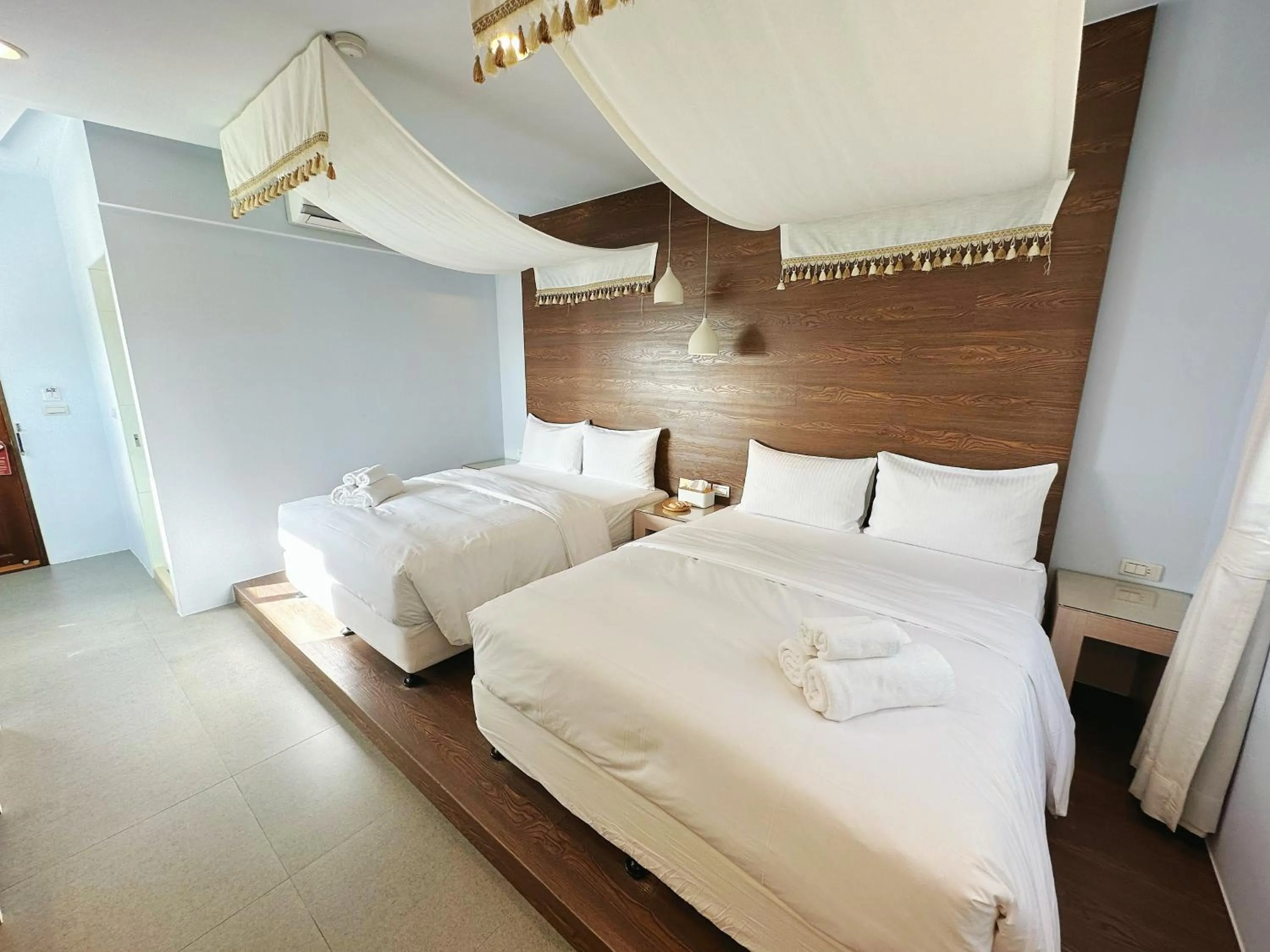 Bed in Bai Sha Tan Cottage