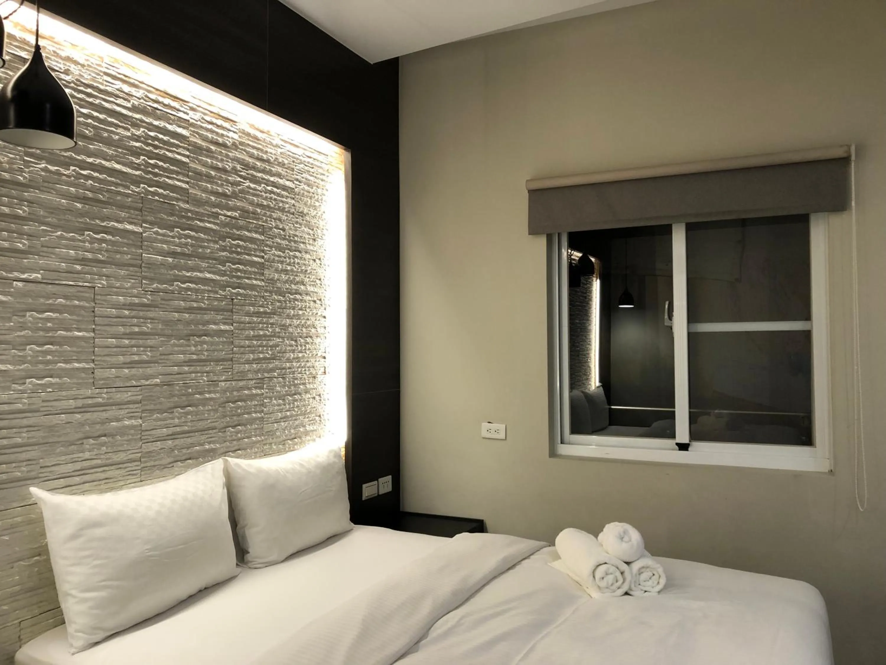 Photo of the whole room, Bed in Bai Sha Tan Cottage