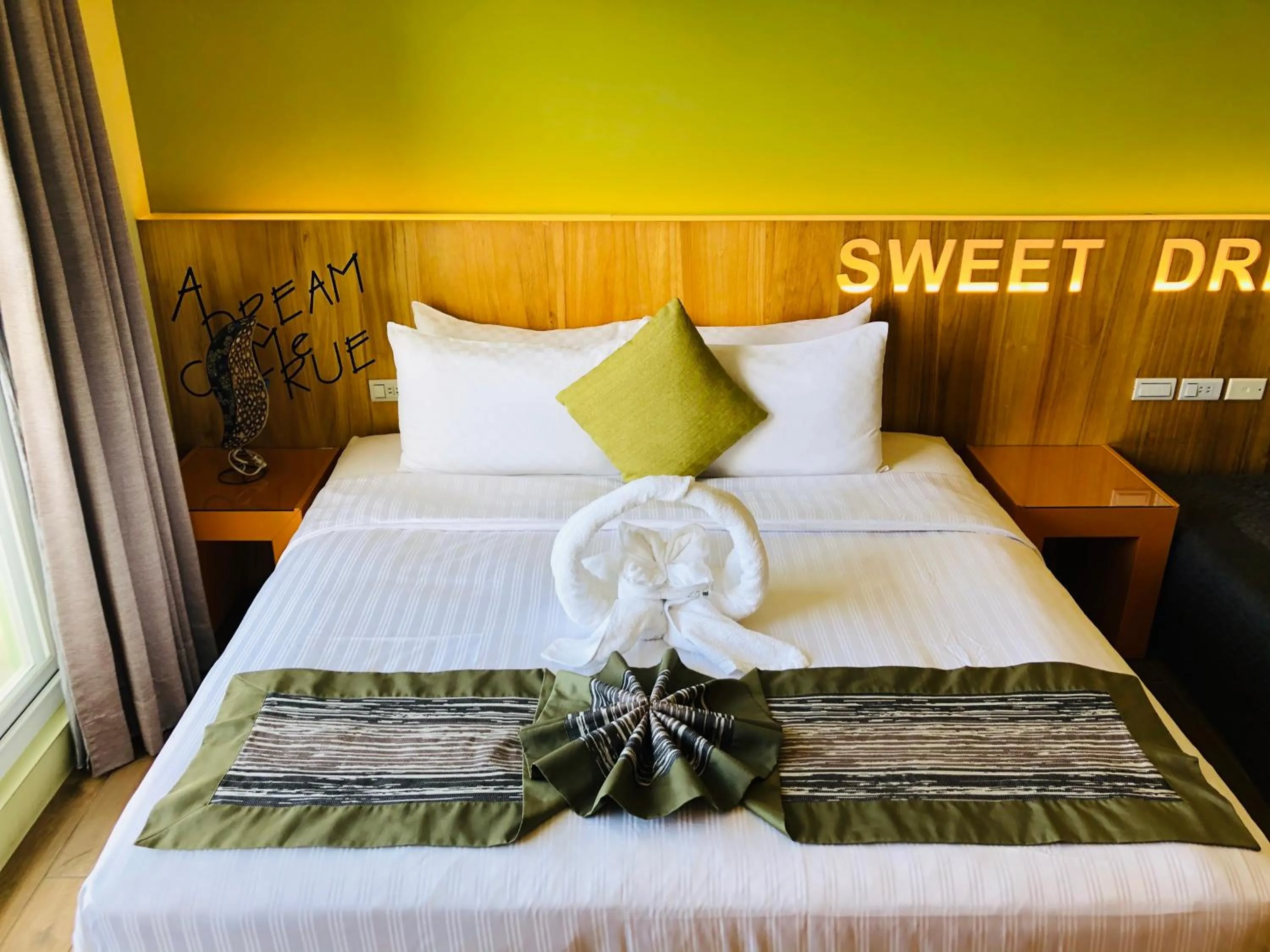 Bed in Bai Sha Tan Cottage
