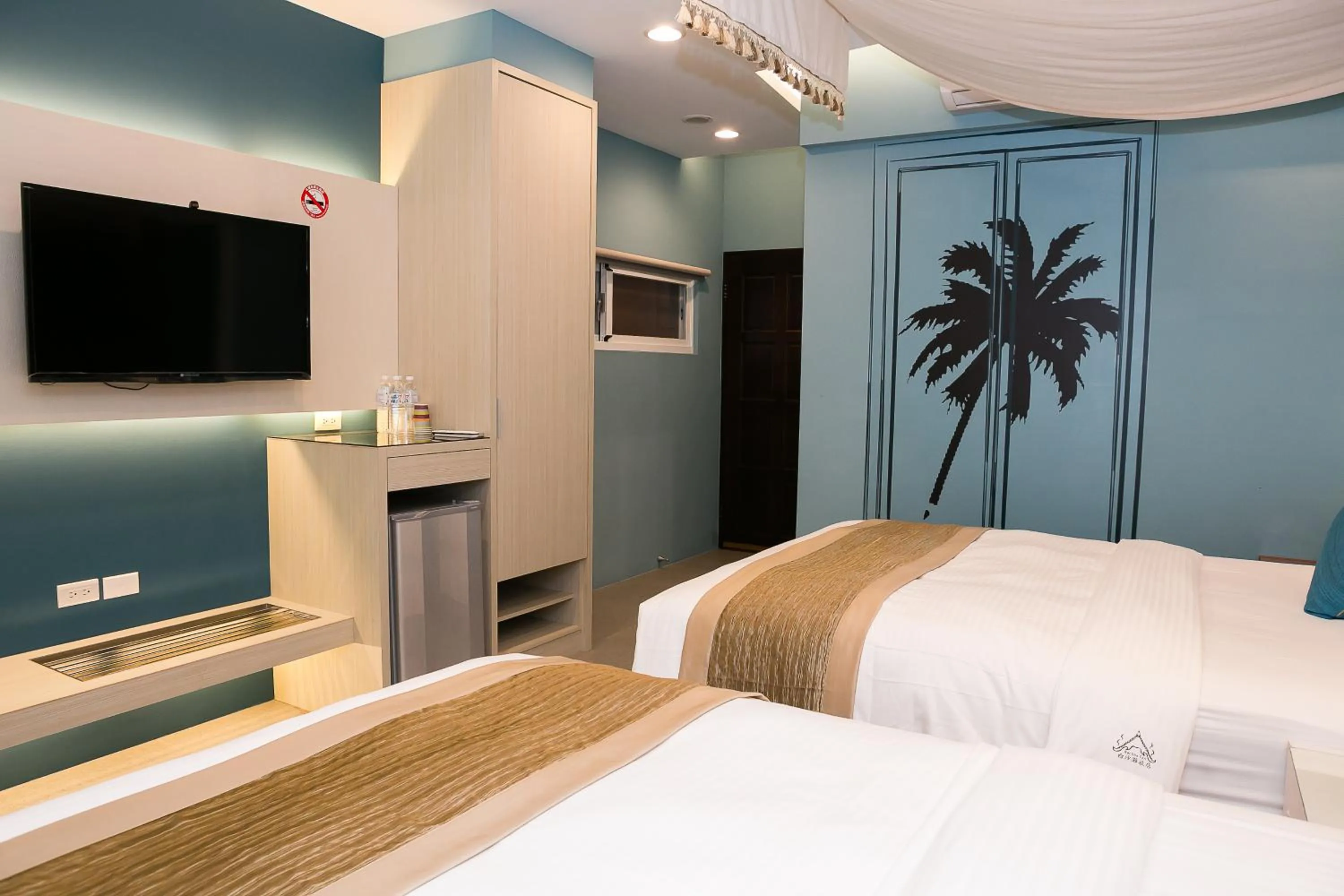Bed in Bai Sha Tan Cottage