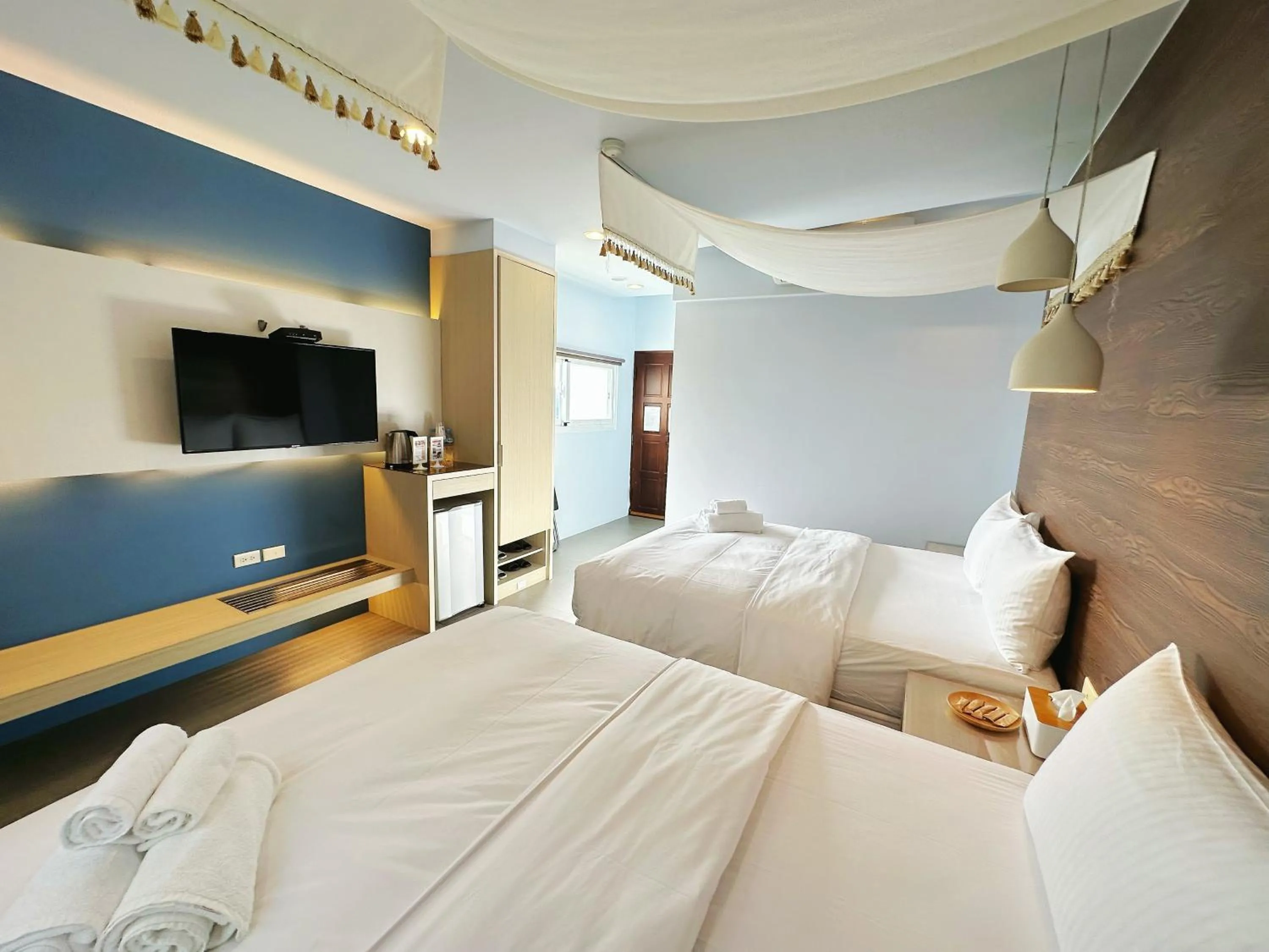 Bed in Bai Sha Tan Cottage