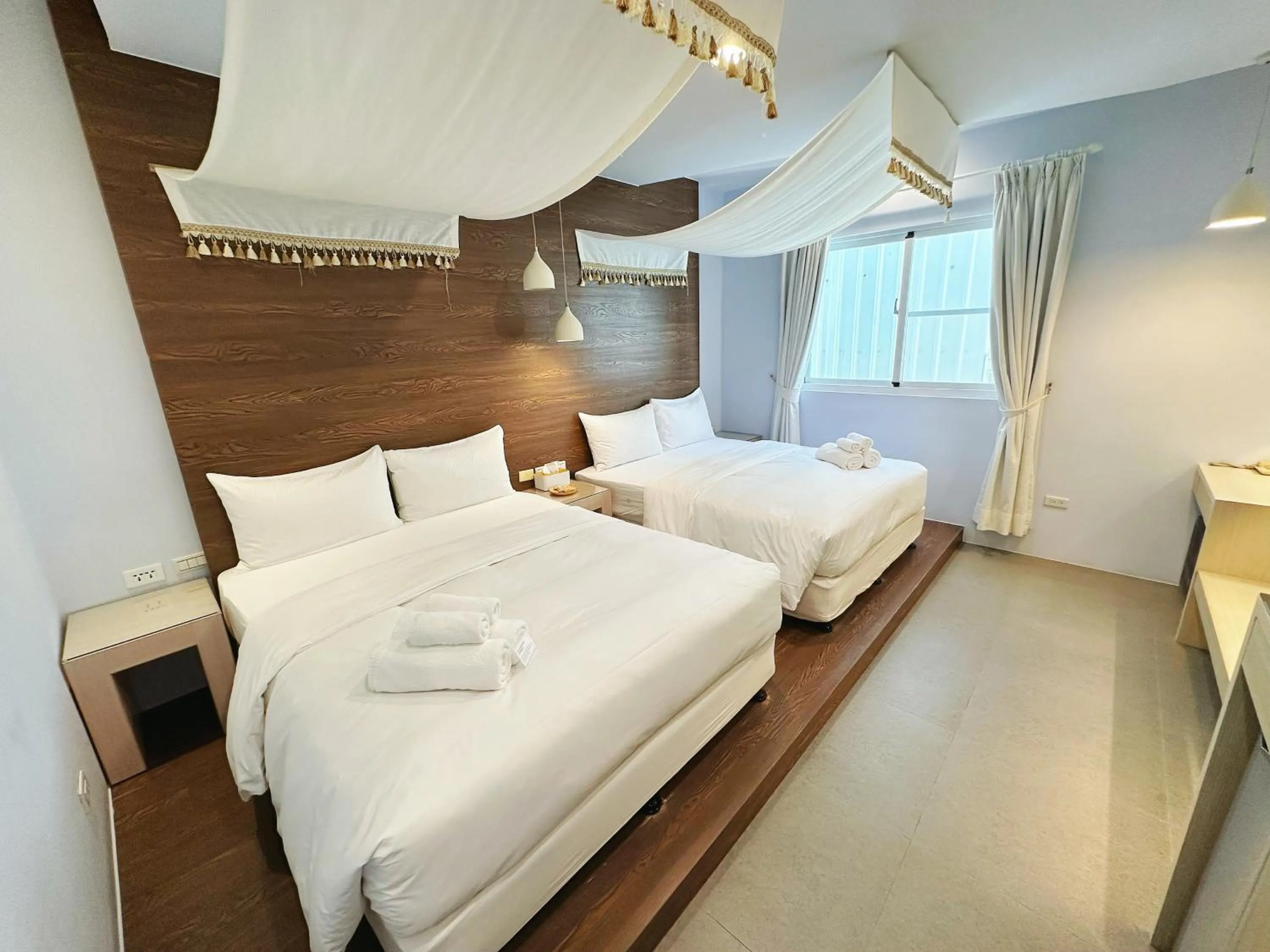 Bed in Bai Sha Tan Cottage