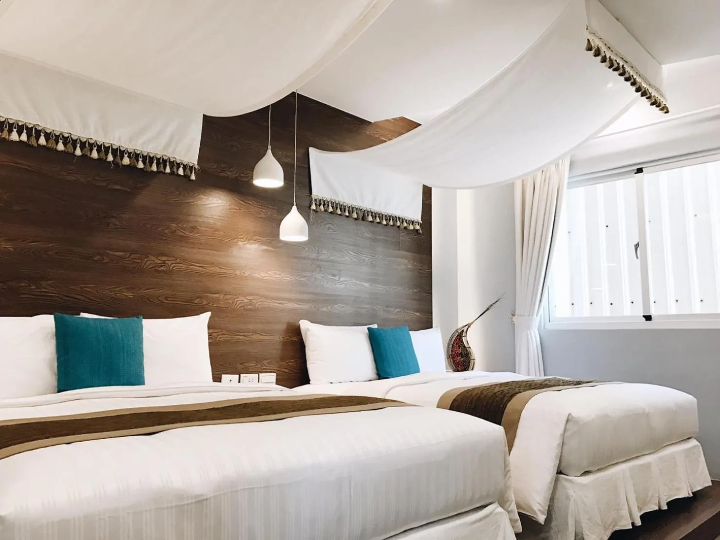 Photo of the whole room, Bed in Bai Sha Tan Cottage
