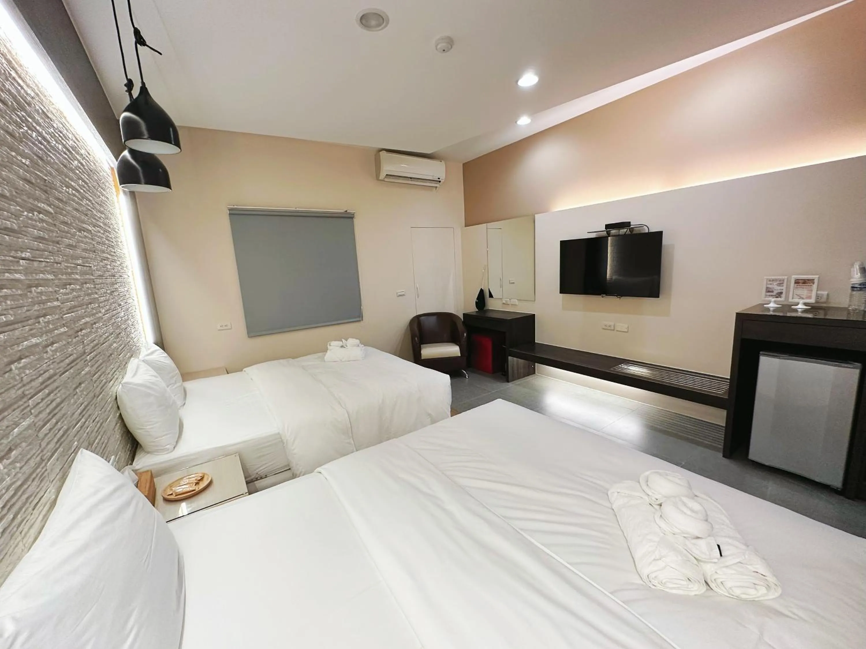 Bed in Bai Sha Tan Cottage