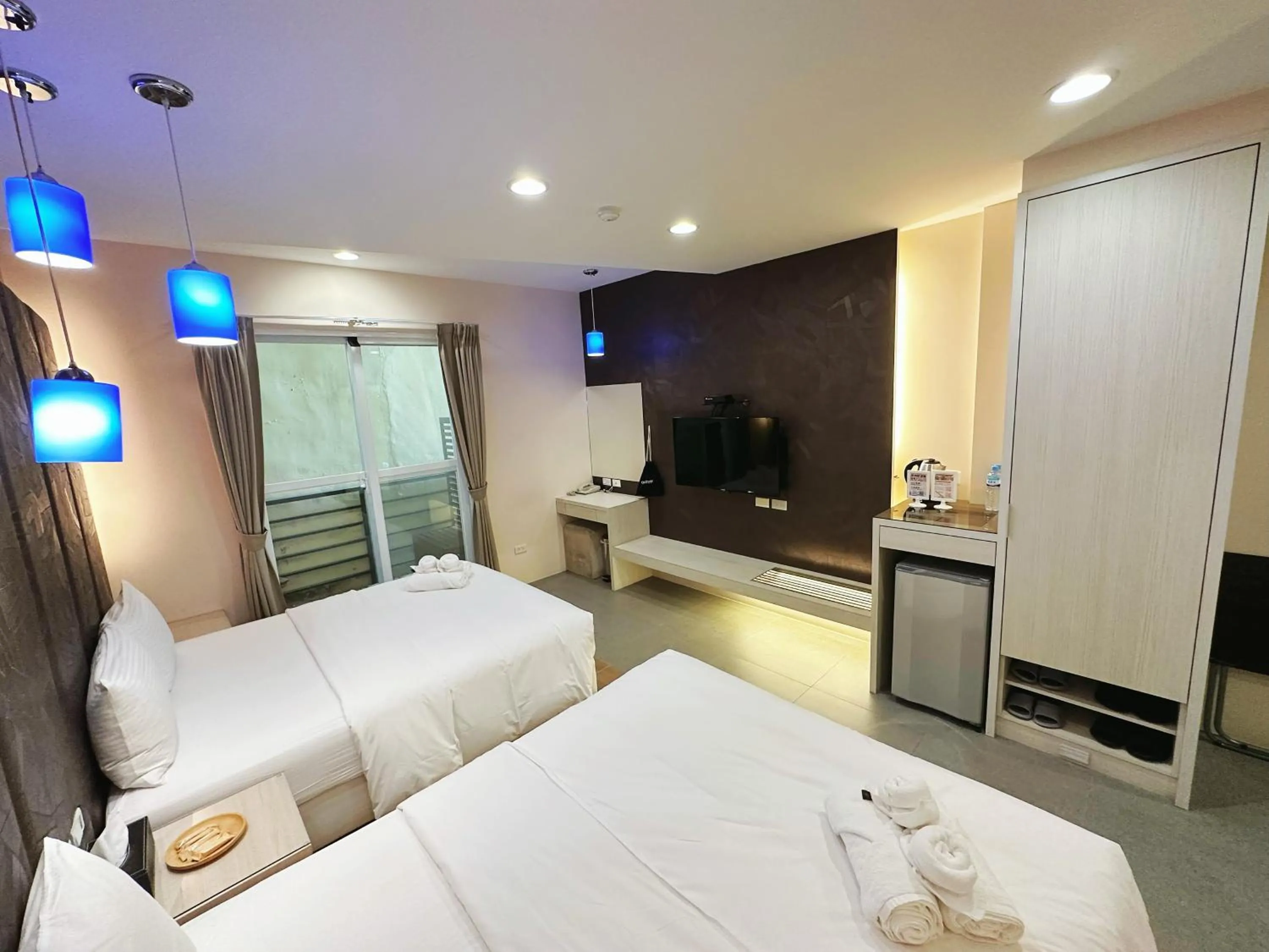 Bed in Bai Sha Tan Cottage