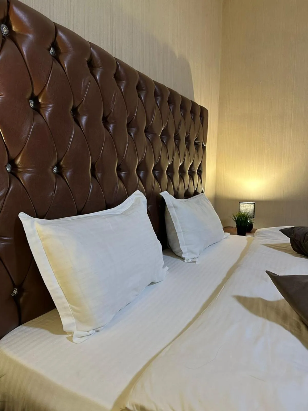 Bed in Deluxe SPA-Hotel