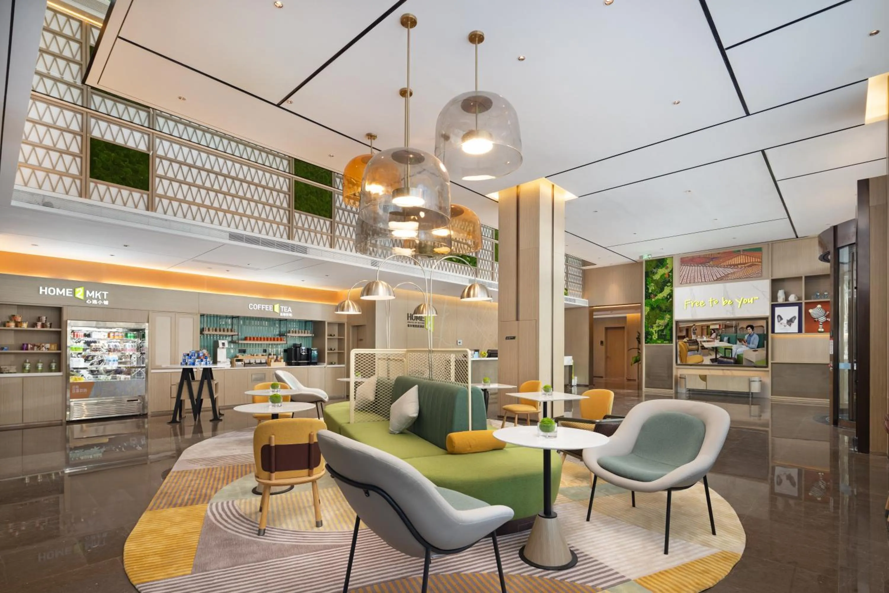 Communal lounge/ TV room in Home2 Suite by Meishan Dongpo